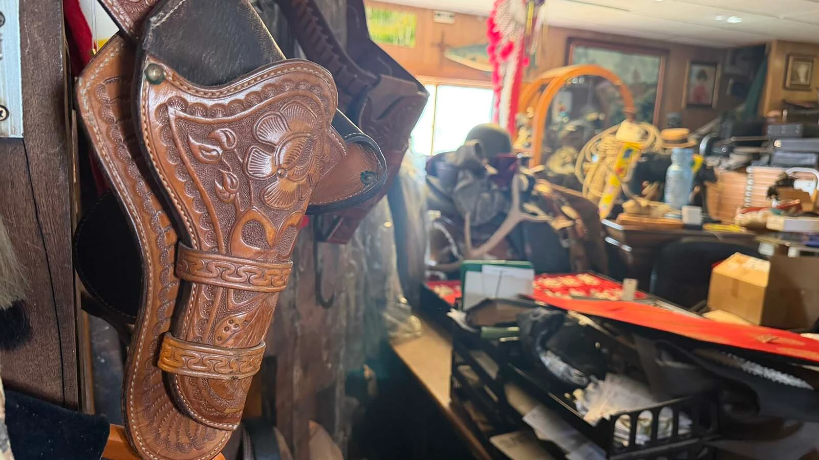 In the Hole-in-the-Wall Antique Store in Meeteetse's old Masonic Hall, be prepared for a treasure hunt. Vintage collectibles and historic antiques are scattered around two floors with tarnished hot rods parked outside. Owner John Fremlin adds to the collection constantly and is on the hunt for items that "speak to him."
