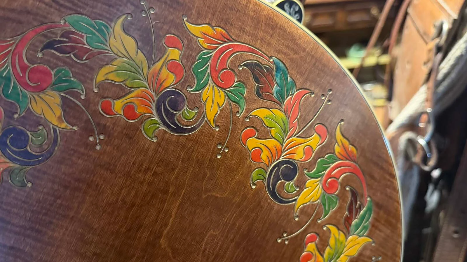 It is a treasure hunt when customers visit the Hole-in-the-Wall Antique Store in Meeteetse. This banjo, valued at $20,000, was 'hidden' in plain sight in a purple case. When opened, a gold-inlayed banjo dazzled the eyes.