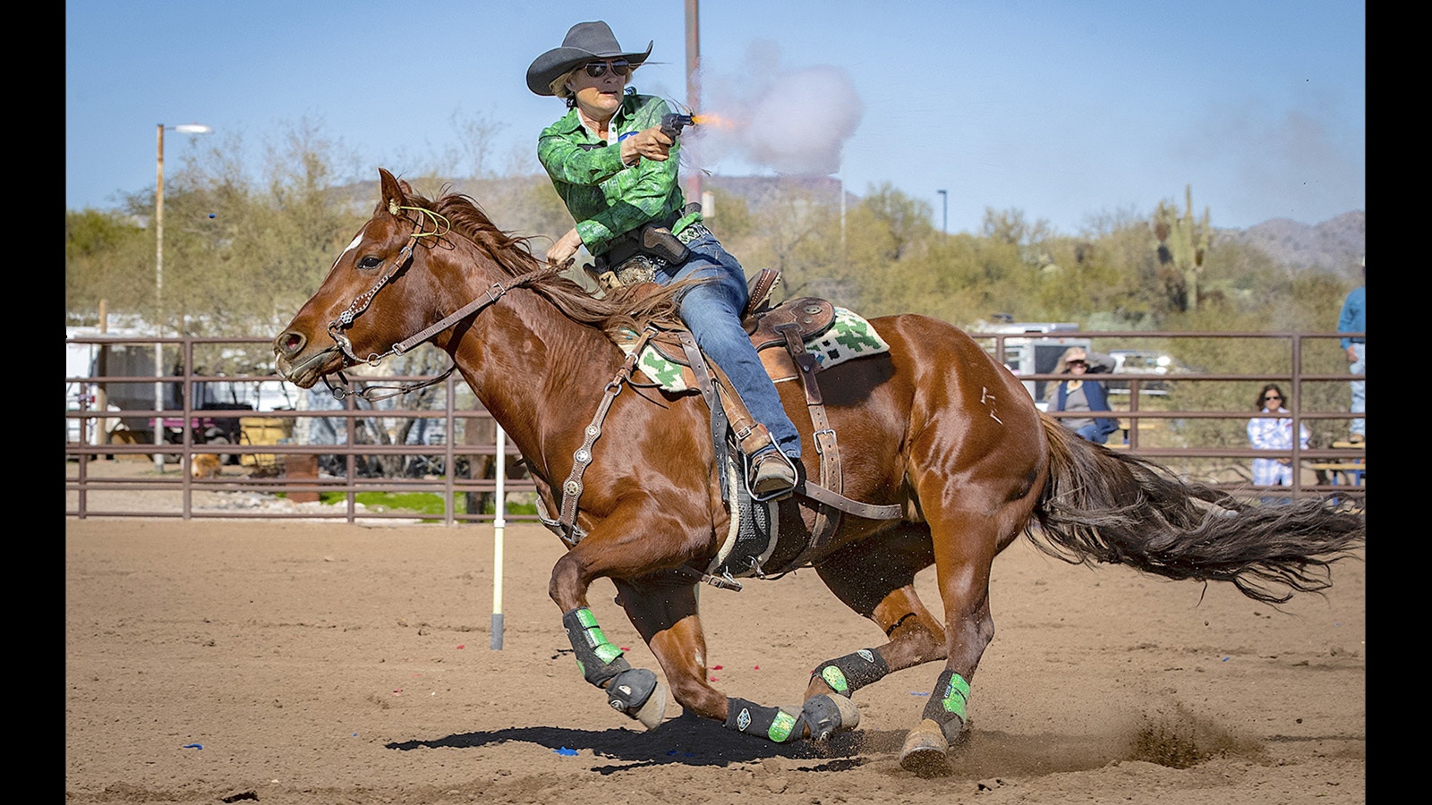 Most horses, as well as competitors, use ear plugs in the sport of cowboy mounted shooting. Notice them here on Kenda Lenseigne's horse.