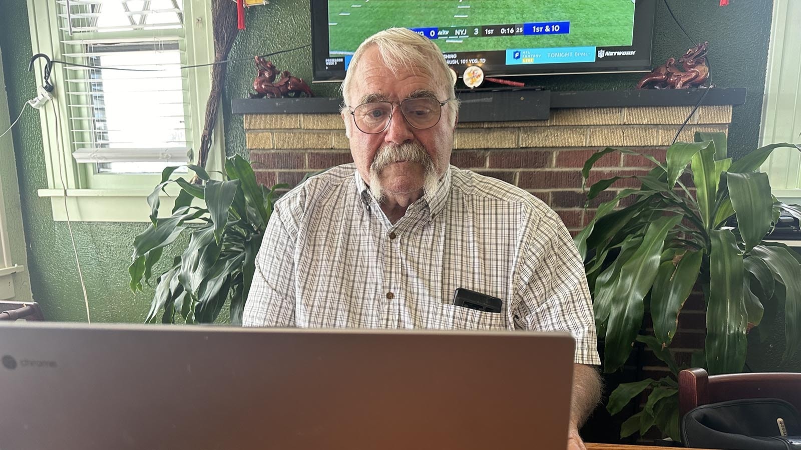 Jack Schmidt used modern technology (his trusty laptop) to record his cowboy poetry recipes and research his favorite cowboy poems in Riverton, Wyoming.