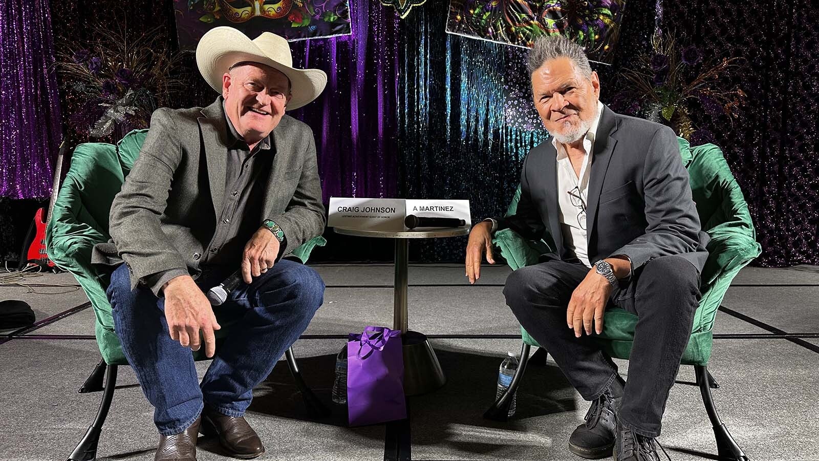 Wyoming author Craig Johnson creates his popular “Longmire” mystery series in a tiny UCross cabin loft he built himself. In 2025, he was recognized with four lifetime achievement awards from prestigious writing and Western organizations. Here he's with actor A.J. Martinez at the Bouchercon Lifetime Achievement Award event.