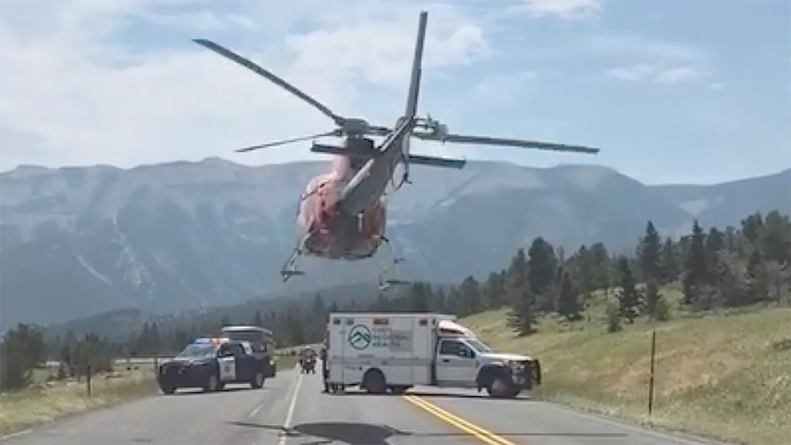 Emergency crews respond to a motocycle crash on the Chief Joseph Scenic Highway.