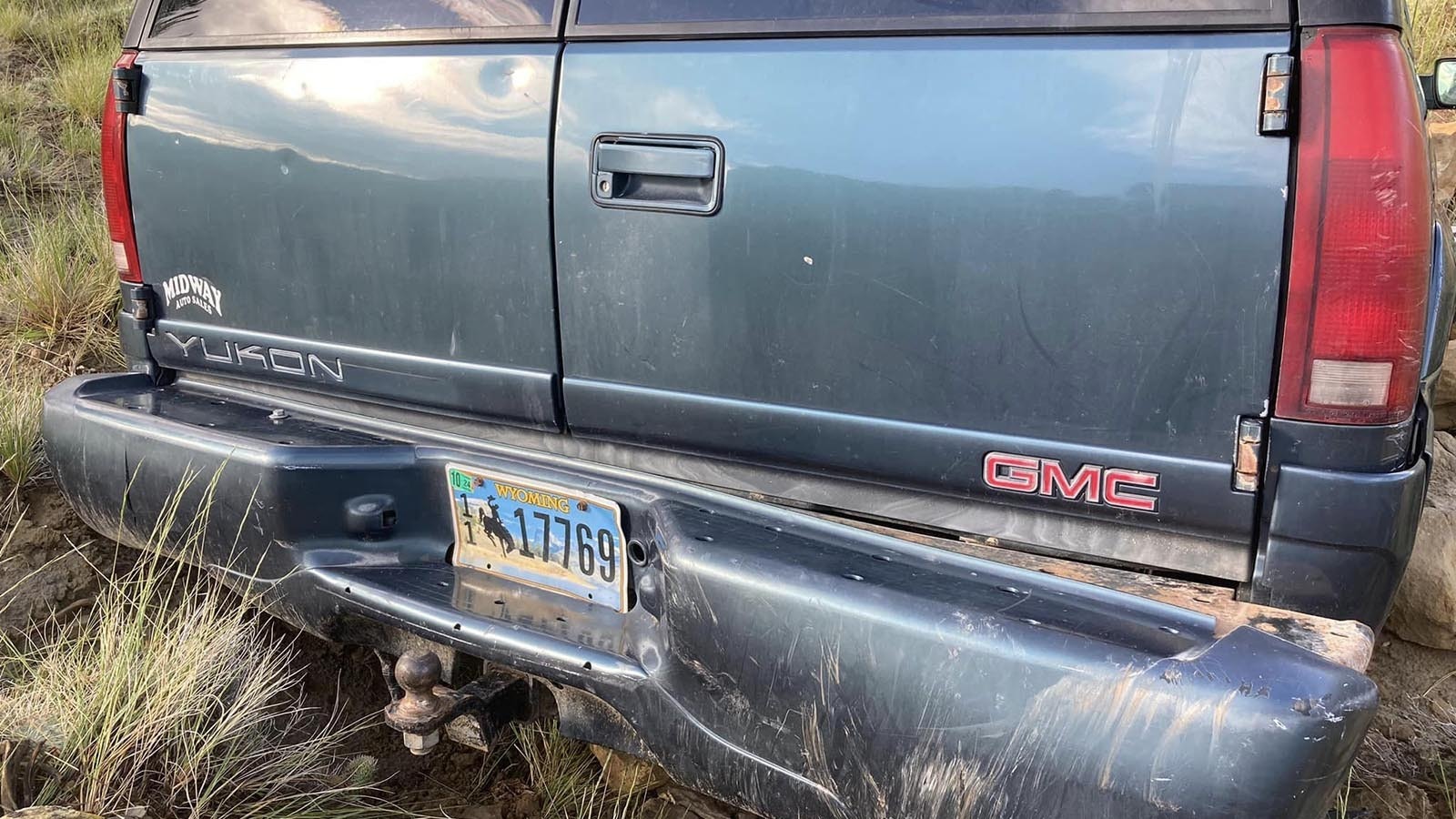 This GMC Yukon that sits crashed and abandoned in rugged terrain off Highway 14-16-20 in northwest Wyoming sparked a lot of speculation. Truth is, a suspected drunk driver left it there.