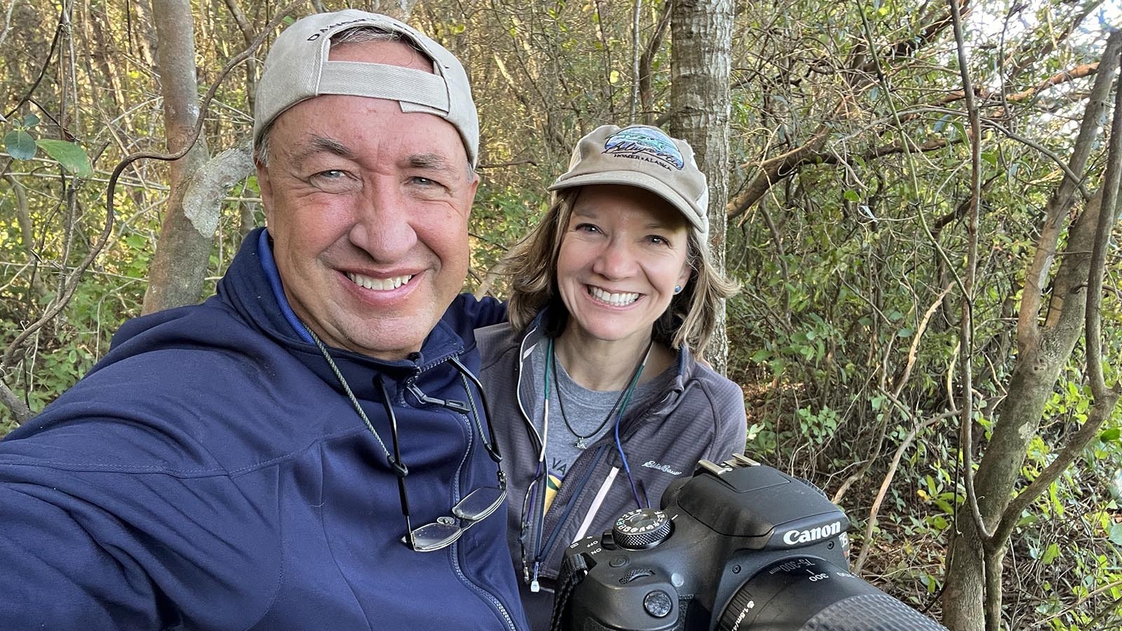 Dan Gryder and Laura Savino photographed the FBI agents as they searched the home property of Richard McCoy, where the parachute was found.