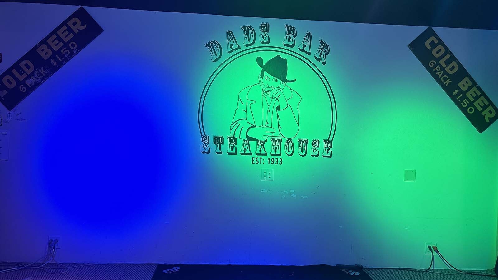 The Dad’s Bar logo is a line drawing of original owner Alf “Dad” Walton. Current owner Terry Gordon said Dad always had a cigar, but never lit it.
