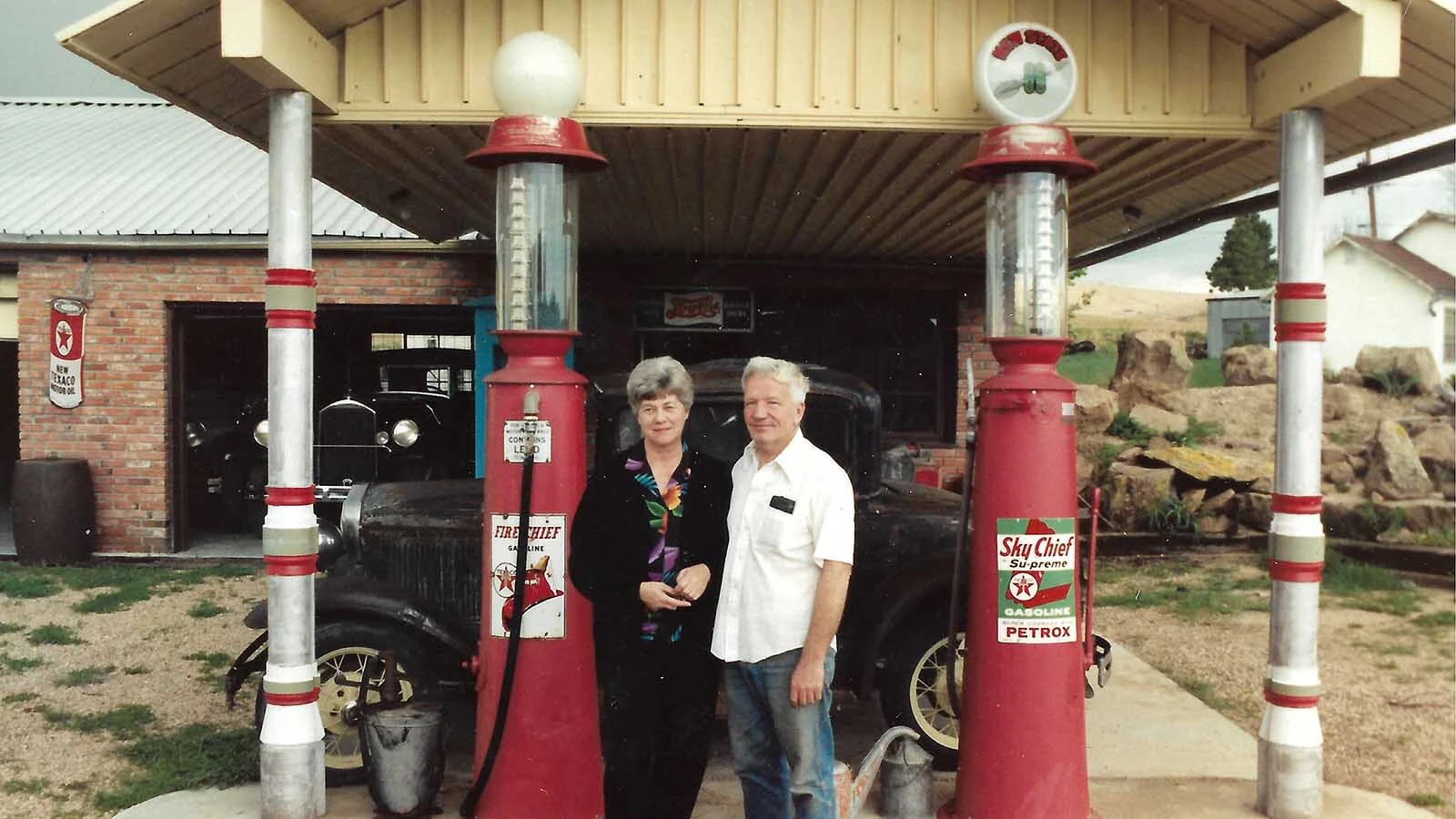 Luann and Alex Connell stand outside their garage in Cheyenne.