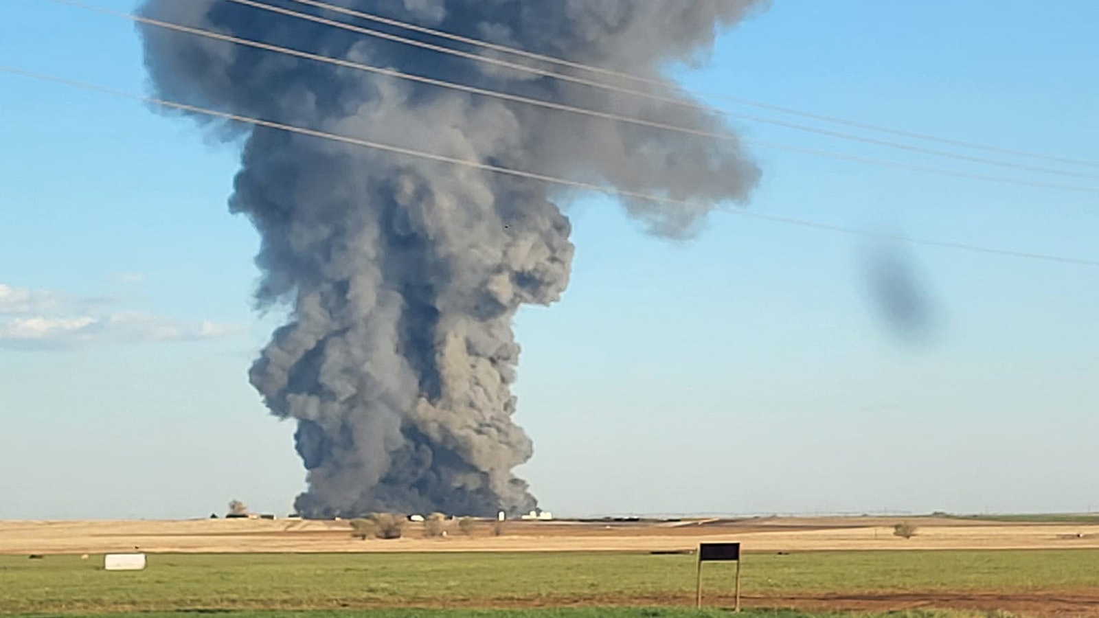A huge column of smoke could be seen for miles after a dairy farm explosion and fire in Texas that killed 18,000 cows.