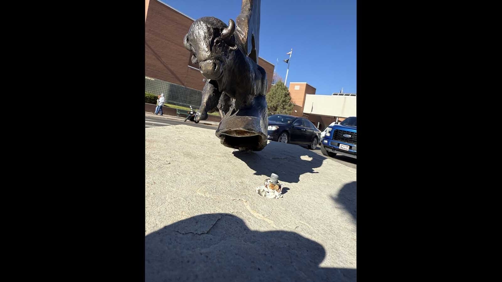 The damage done to "Buffalo Nation," a bronze sculpture by Chris Navarro on the corner of Pioneer Avenue and W. 19th Street in Cheyenne. The sculpture wasn't damaged but has been removed so it can be fitted to its pedestal with new bolts to make it even more secure.