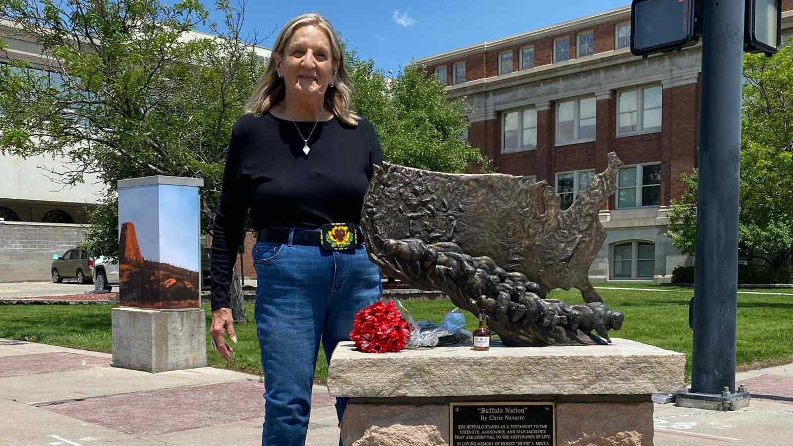 Sue Mecca, the donor who financed "Buffalo Nation," at the installation of the bronze sculpture on July 16, 2025. Mecca donated the sculpture in memory of her husband, Ernest, which makes the damage done to it "wrong on so many levels" to Cheyenne art dealer Harvey Deselms.