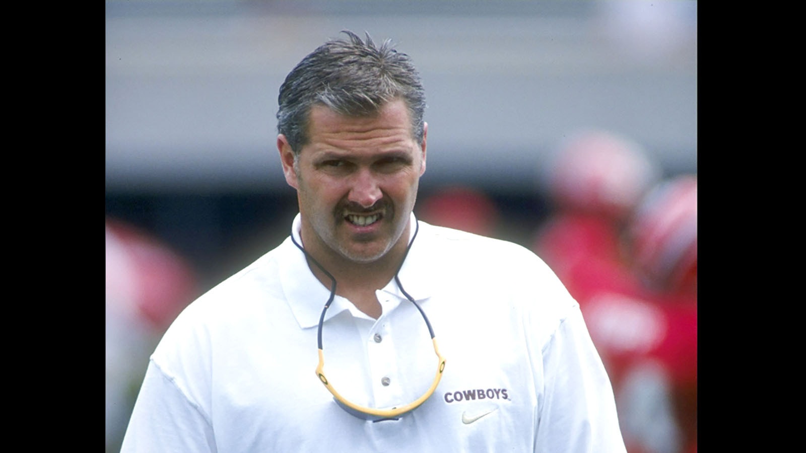 Dana Dimel when he was head coach for the University of Wyoming football team in 1997-99. He died Dec. 3, 2024, at the age of 62.