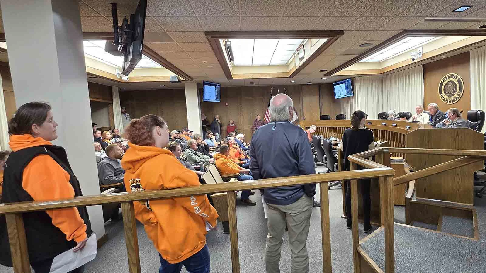 A long line of people formed on both sides of the room during an emotional, four-hour hearing before the Public Services Committee on a moratorium for new data centers.