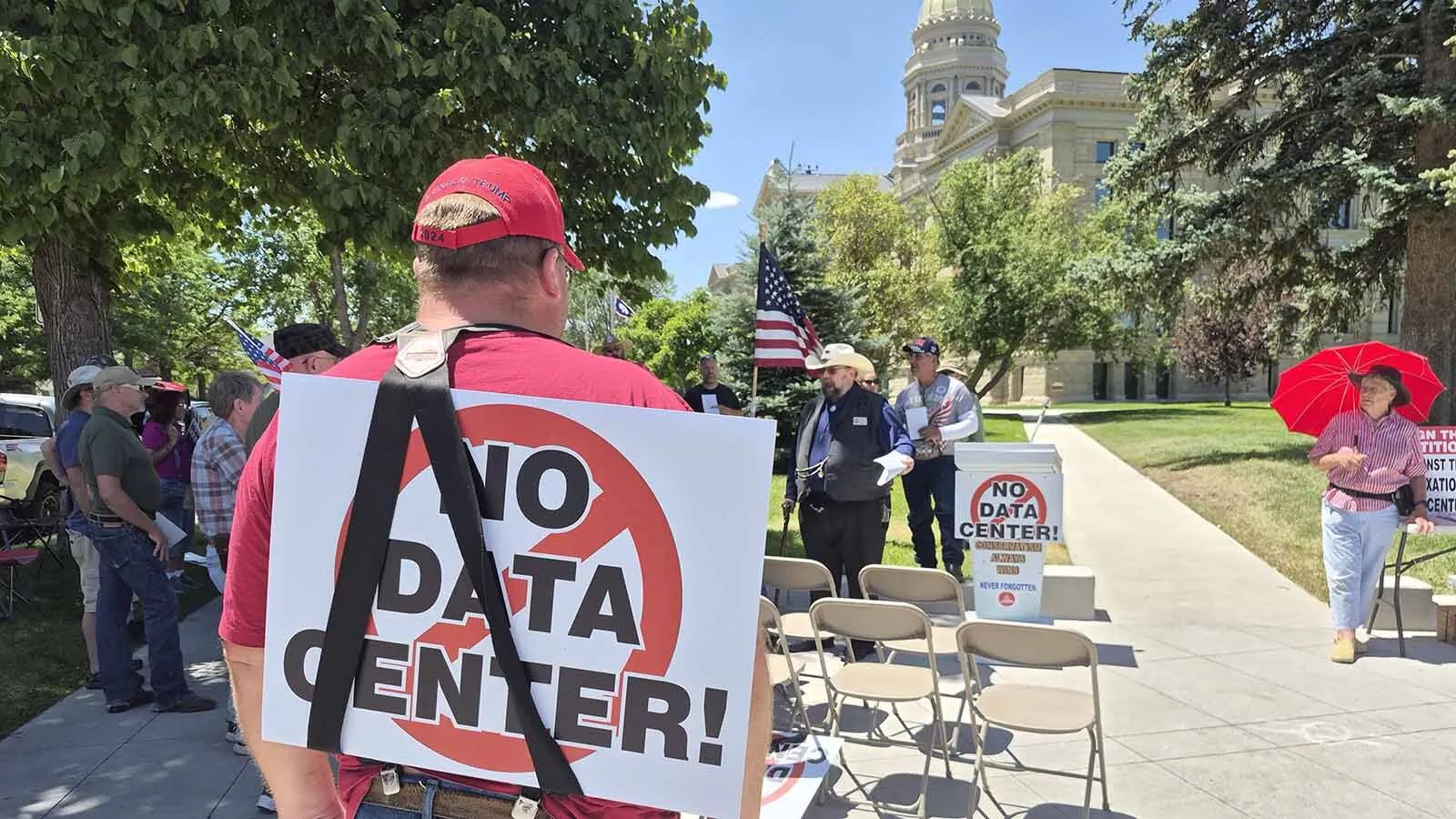 A small group of a few dozen people railed against existing and proposed data centers at the Wyoming Capitol on Saturday. “Anytime you scream ‘wolf,’ there actually is a wolf coming. It’s data centers,” said organizer Taylor Haynes. "It’s our government.”