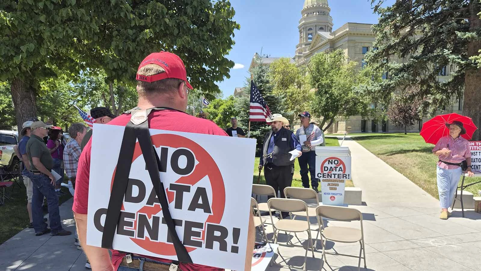 A small group of a few dozen people railed against existing and proposed data centers at the Wyoming Capitol on Saturday. “Anytime you scream ‘wolf,’ there actually is a wolf coming. It’s data centers,” said organizer Taylor Haynes. "It’s our government.”