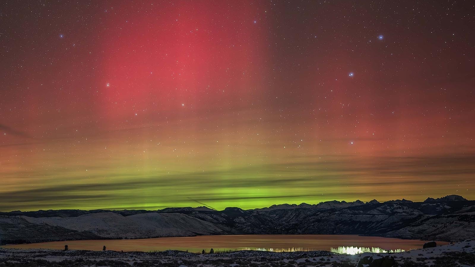 Wyoming photographer Dave Bell spent New Year’s Eve watching some of Mother Nature’s fireworks. He captured the stunning reds and greens of a rare New Year's Eve aurora over Wyoming, a sign that 2025 could be even better than last year for auroras.