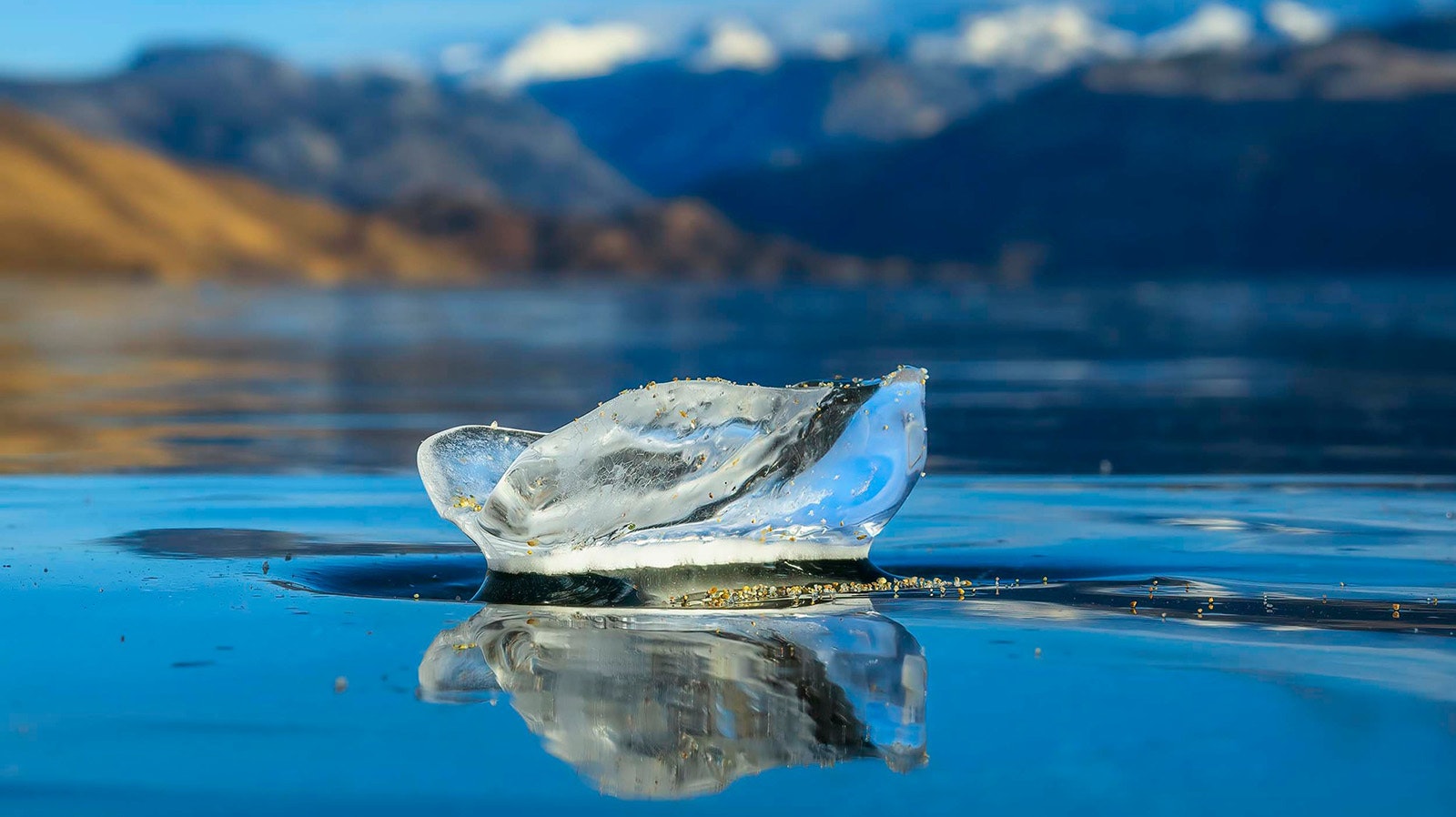 The ice on Fremont Lake was so clear and pure, a piece of it floating in the water looks like a splash.
