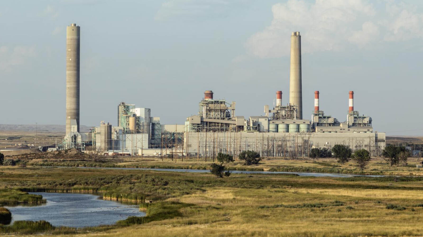 Skyrocketing power demand from data and AI centers is reviving calls for more coal-fired electricity and fuels debate about the role of Wyoming coal in the nation’s energy future. Experts say the market has shifted in ways that might still undercut coal. Above is the Dave Johnston coal-fired power plant near Glenrock.