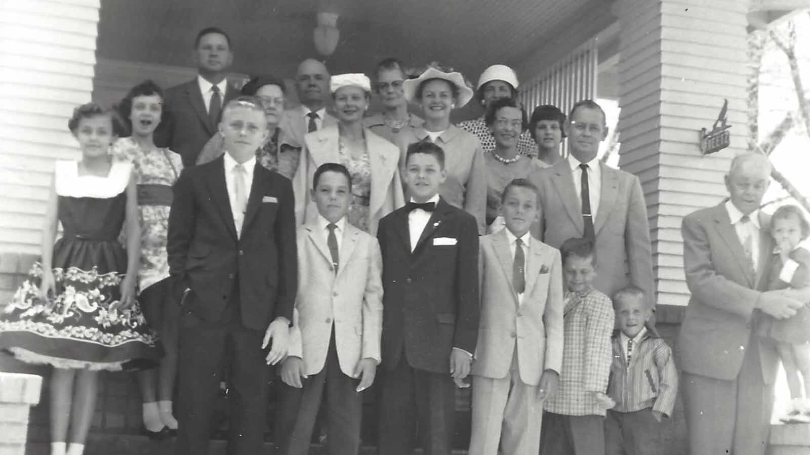David Reetz, front center with bow tie, poses with his family, grandparents, and cousins after his Lutheran confirmation day. His faith remains an important part of his life.