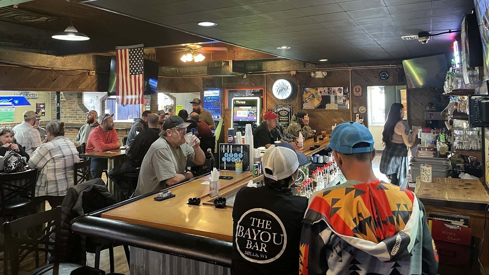 Day drinking is underrated. It's playfully subversive, and also a little edgy, like a statement that tells the world, “I do what I want, when I want!” Even the power going out doesn’t phase the day-drinking “Millbillies” at the Bayou Bar in Mills.