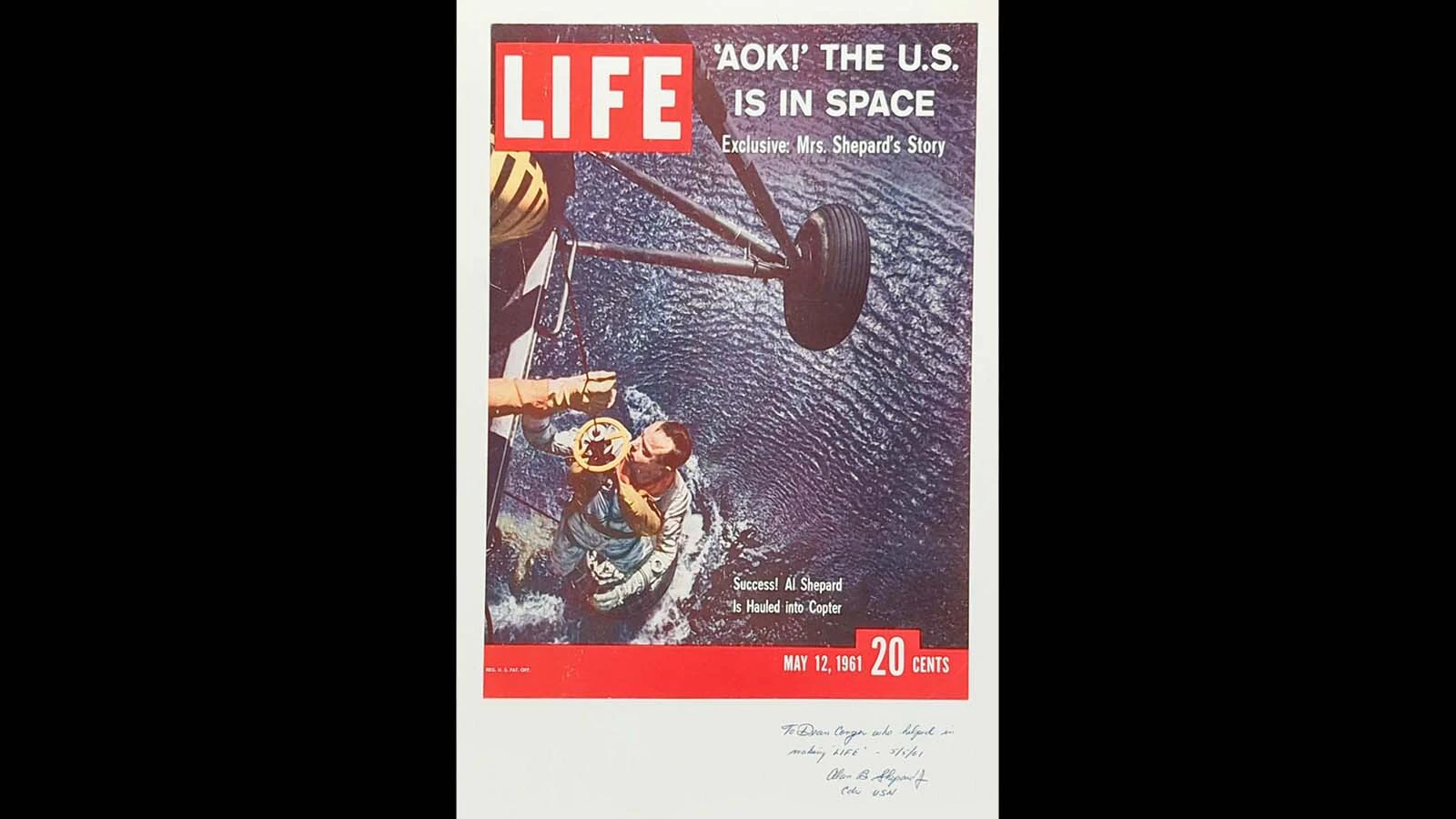 A photo taken by Dean Conger for Life Magazine of Alan Shepard being hauled into a helicopter from his NASA Mercury mission.