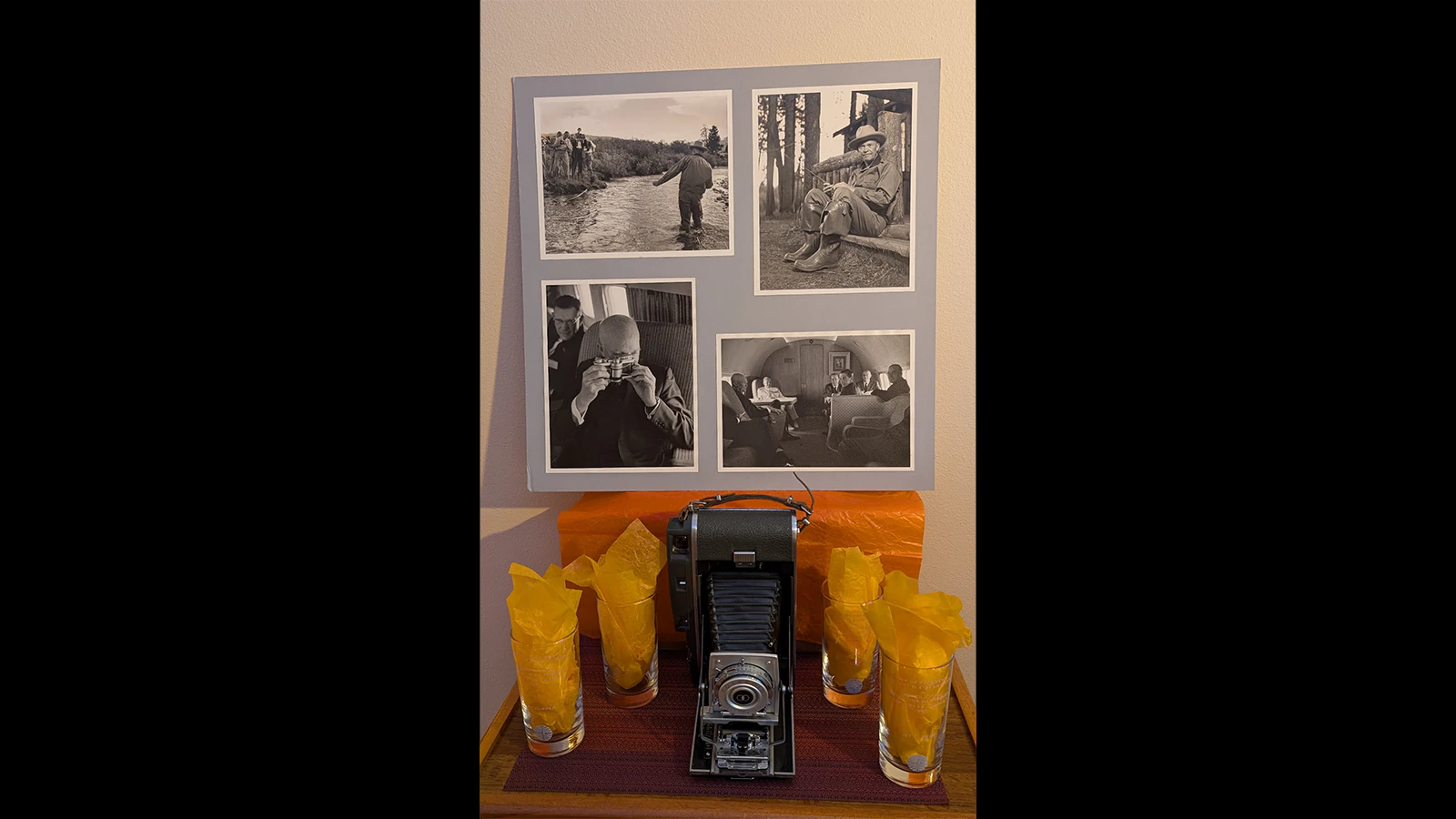 Dean Conger accompanied President Dwight Eisenhower on a trip to South America in the 1960s. His son and daughter-in-law have a framed poster of that trip as well as souvenir water glasses from it.