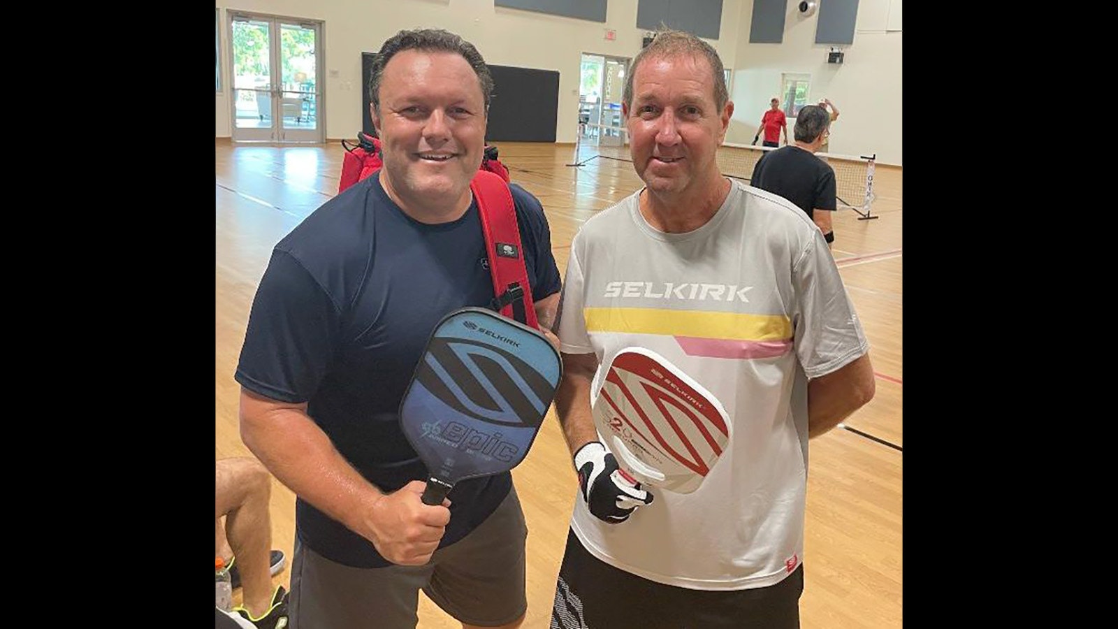 Dean Matt, left, is attempting to set a world record for playing pickle ball tournaments. He's pictured here with playing partner Shannon Yeager.