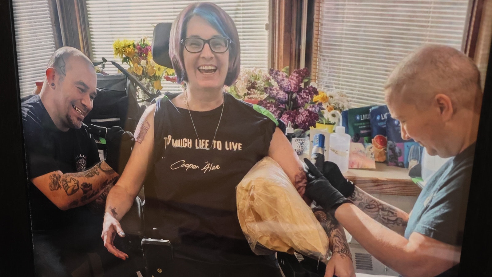 A photo taken of Deanna Cotton getting her tattoos has been enlarged and put in a frame for her by Central Wyoming Hospice staff.