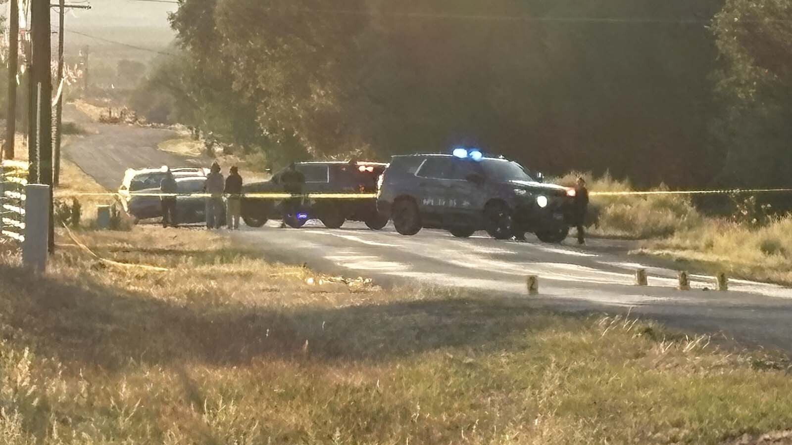 Investigators of a death scene Saturday morning north of Riverton took photographs not just of the south side of the road where the body lay, but of points of interest in the road and on its north shoulder as well.