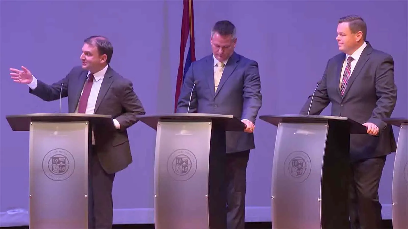 Secretary of State Chuck Gray, left, brought up data centers repeatedly and clashed with the moderator during a U.S. House forum Tuesday night in Sheridan. Reid Rasner, right, criticized Gray, while multiple candidates claimed to be leading the race. State Senate President Bo Biteman is between them.