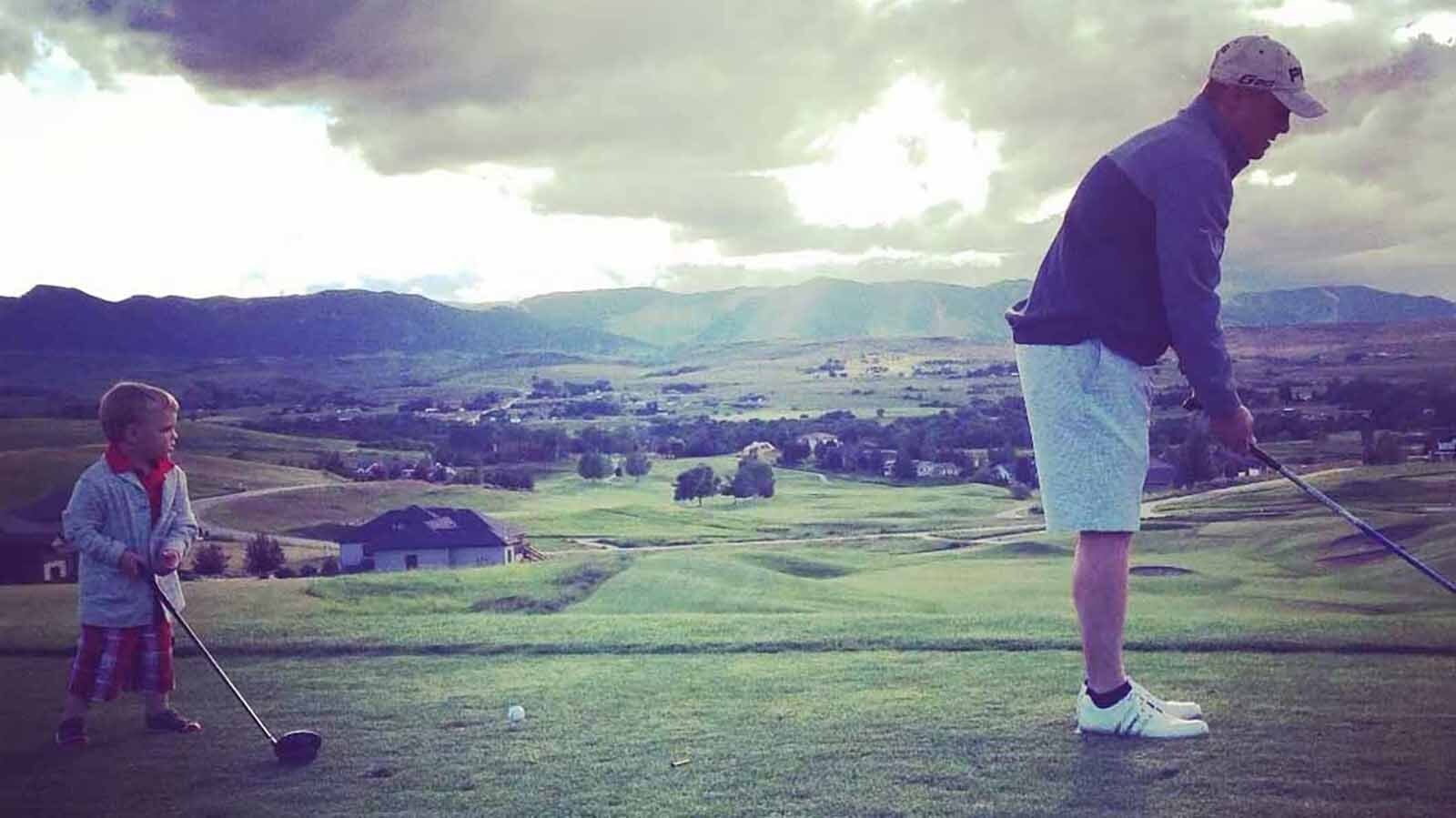 Declan Jacobson, 2, plays golf with his dad Arik in 2013.