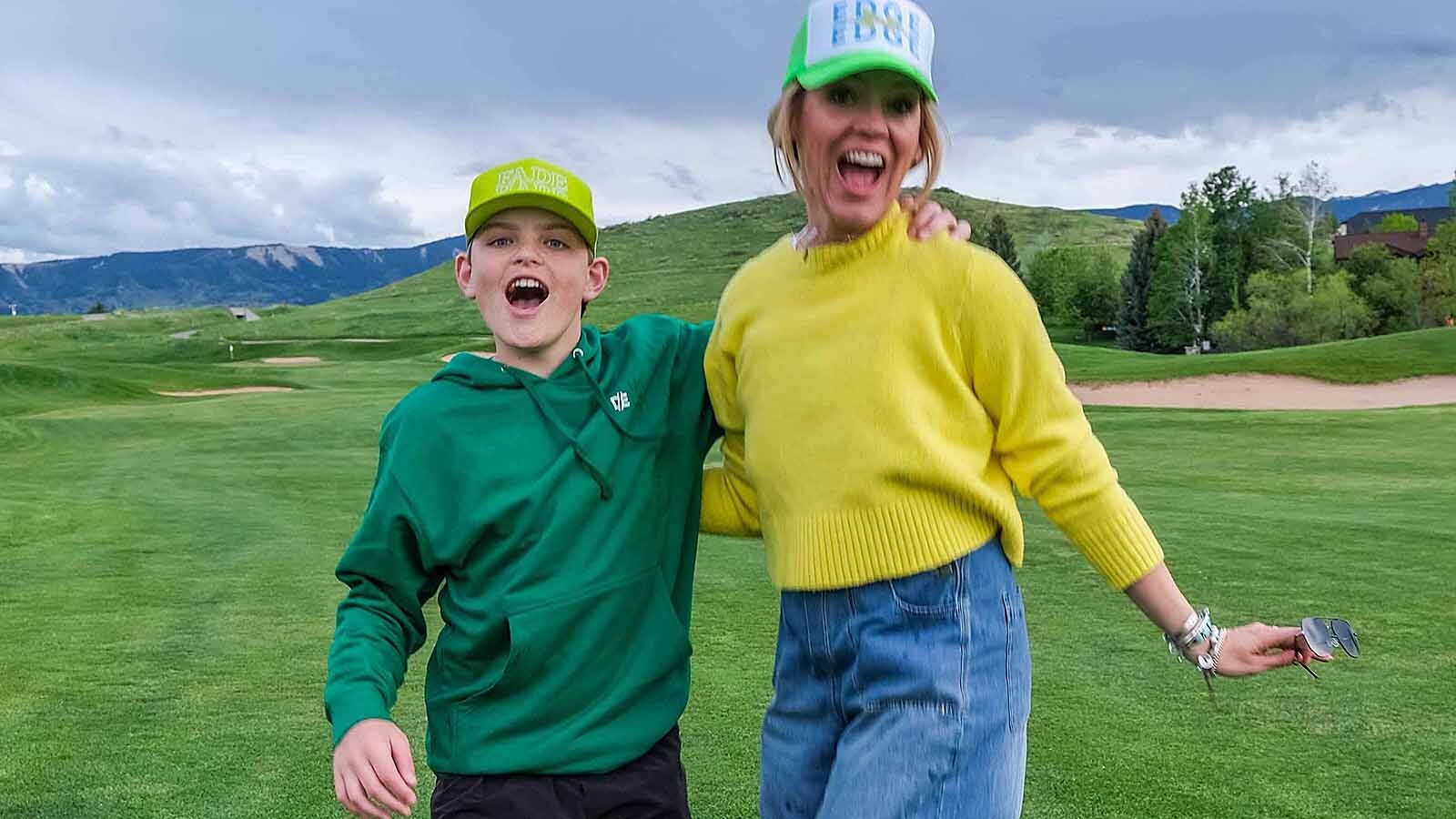 Declan and Jeriann Jacobson clown around during a photo shoot for Double Edge Golf.