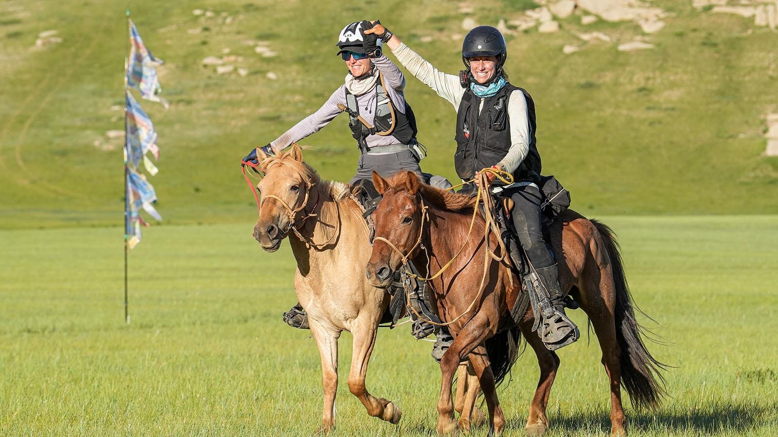 Deirdre Griffith of Jackson, Wyoming, and riding partner Willemien Jooste in the 2022 Mongol Derby, which Griffith won.