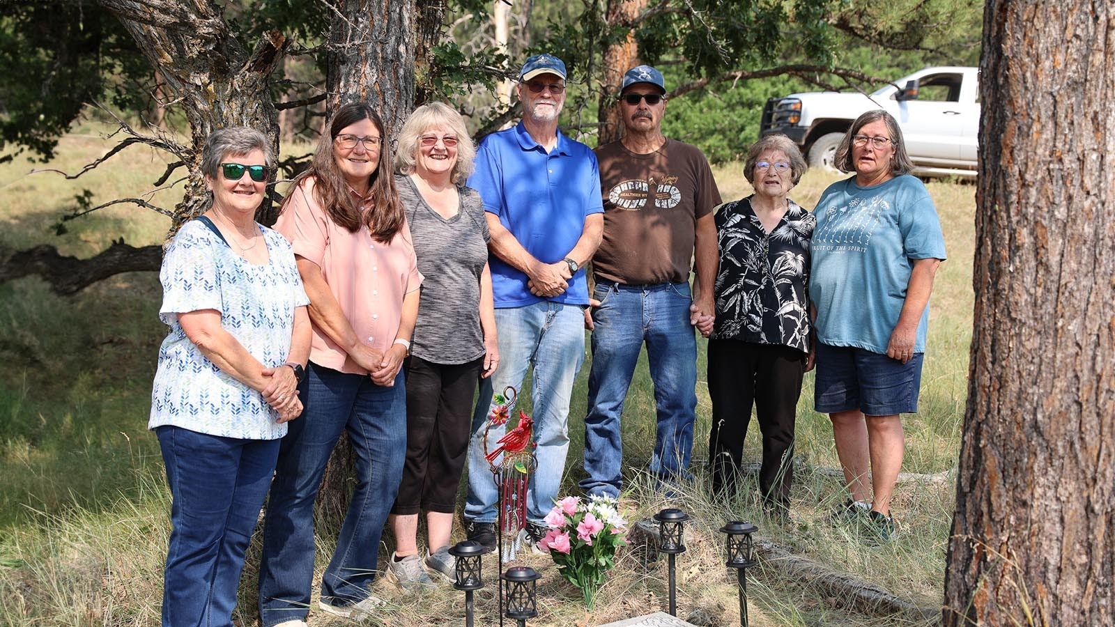 The Shaw sisters, Jodi Ferguson, Jan Farella and Kim Meyers stand with their brother Rick and mom Myra and Diana and John White at the memorial for Denise Clinton.