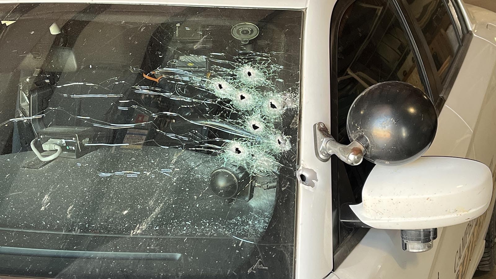 The driver's side of this Cambpell County Sheriff's Office patrol car shows where the windshield took a shotgun blast from a suspect on Sunday, Aug. 4, 2024. The deputy wasn't hurt, but the suspect was killed.