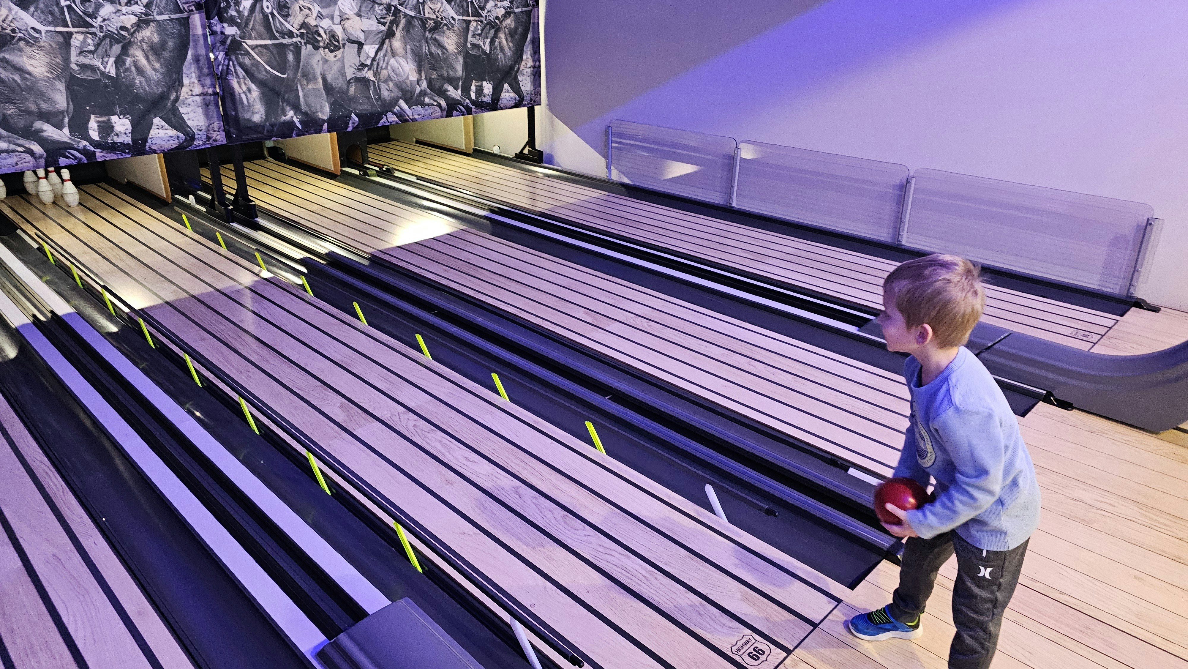 Cooper Goodman gets set to throw the bowling ball in a game of Pony Pins at Derby Lanes in Cheyenne on Wednesday night.