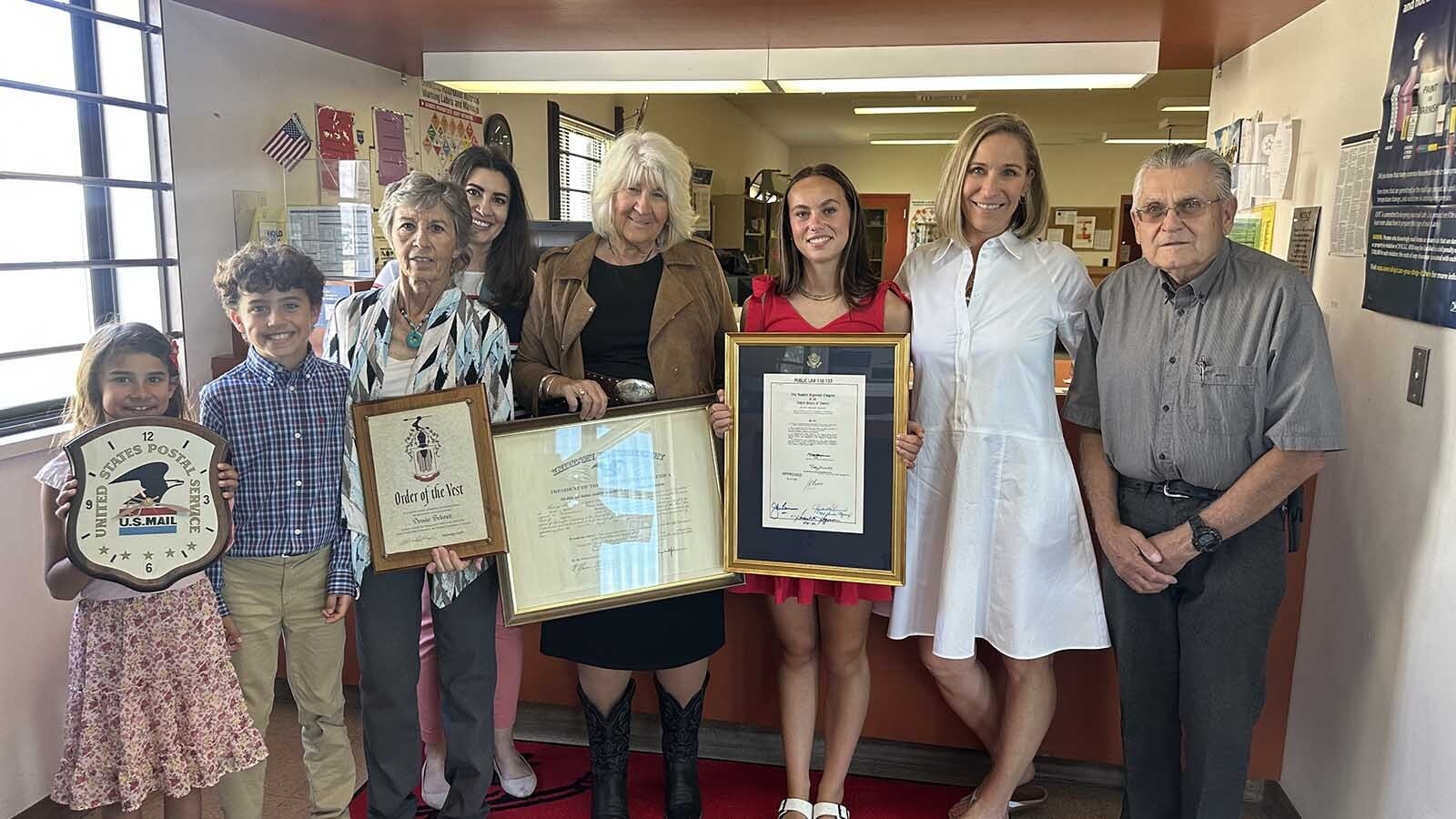 The family of Dessie A. Bebout visited the newly named Dessie A. Bebout Post Office Building on Wednesday after the building was officially dedicated and the plaque newly hung.