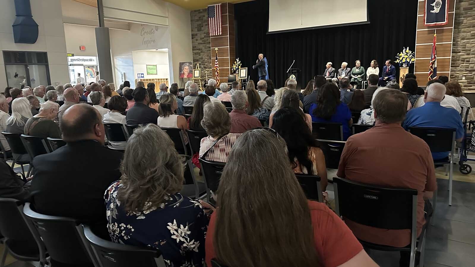 More than 100 people gathered Wednesday to celebrate the dedication of the U. S. Post Office in Shoshoni, Wyoming as the newly named Dessie A. Bebout Post Office Building.
