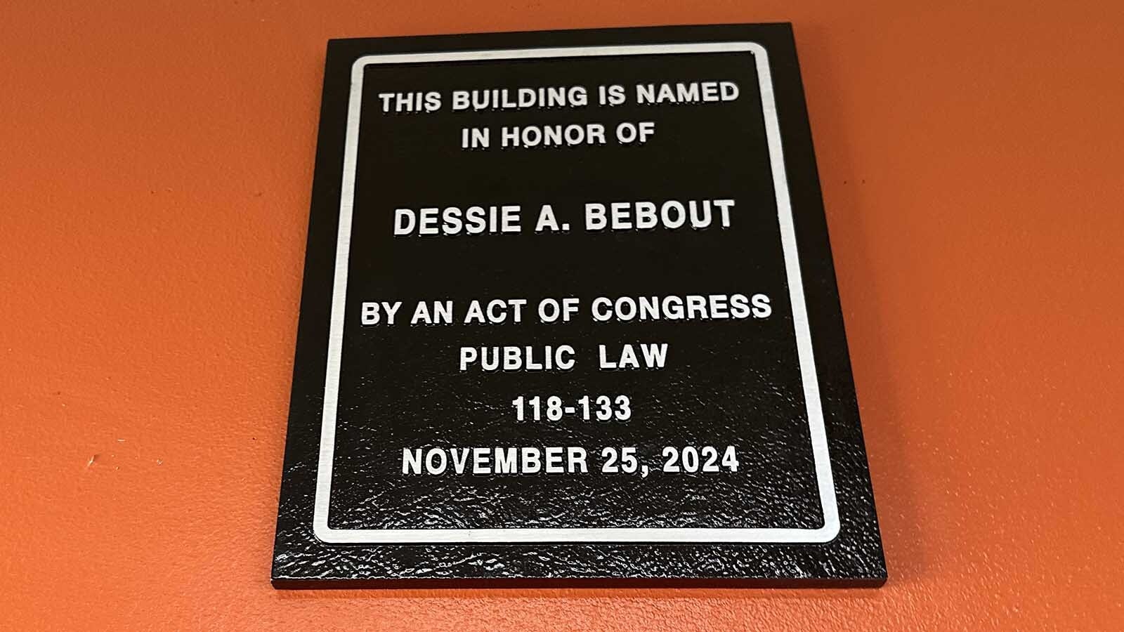 The new plaque recognizing the newly named Dessie A. Bebout Post Office Building was hung in the U. S. Post Office front lobby on Wednesday to recognize the legacy of local postmistress, Dessie Bebout.