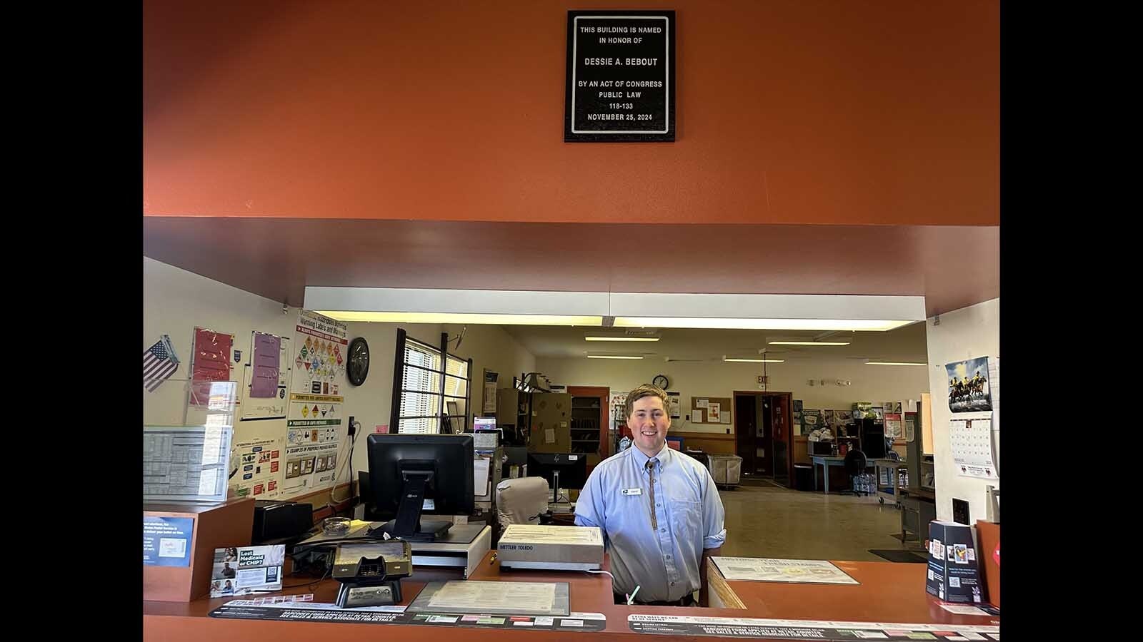 The new plaque recognizing the newly named Dessie A. Bebout Post Office Building was hung in the U. S. Post Office front lobby on Wednesday to recognize the legacy of local postmistress, Dessie Bebout.