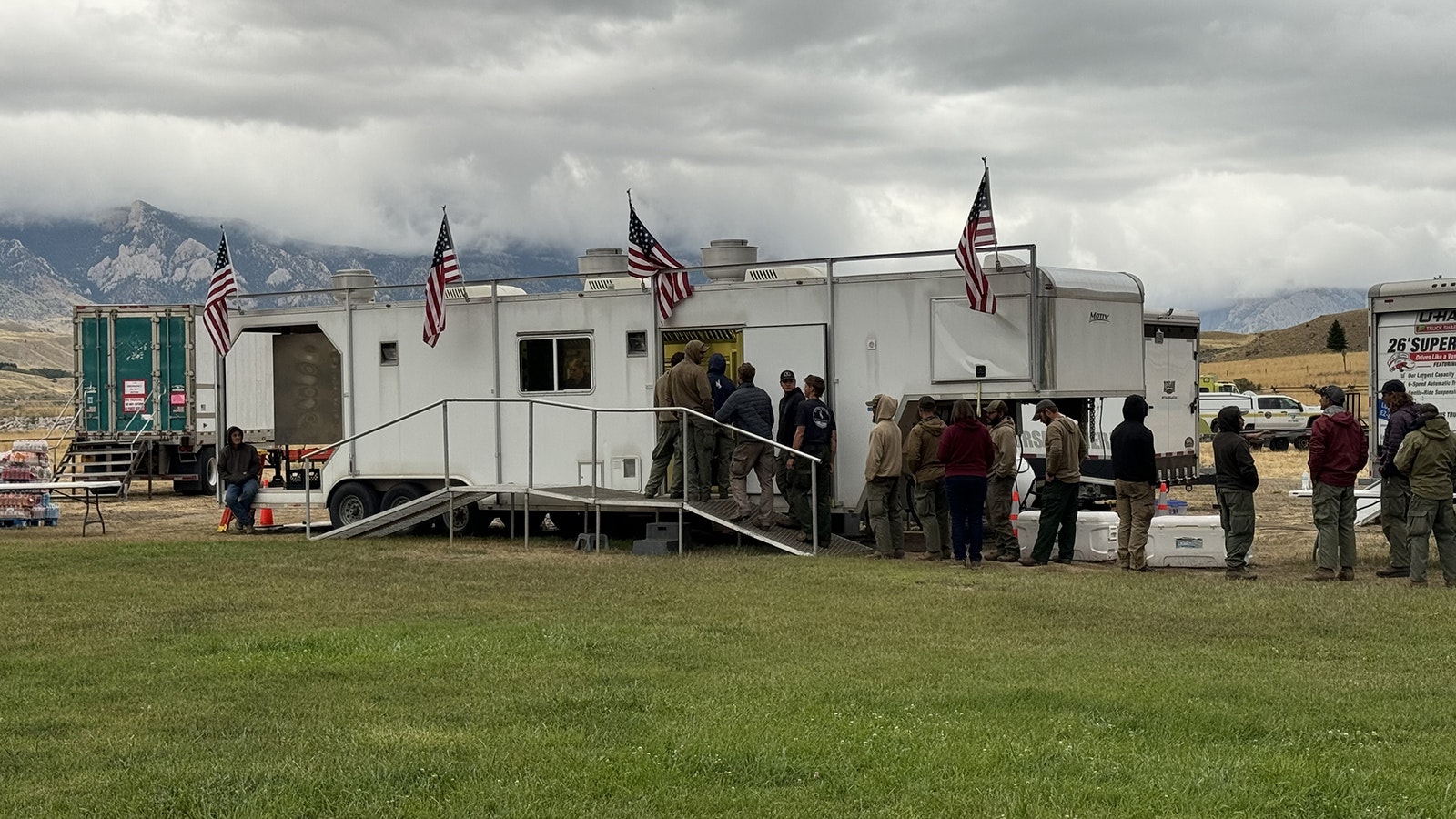 The Devil’s Canyon crew lines up for dinner at base camp while working the Clearwater Fire in Wyoming.