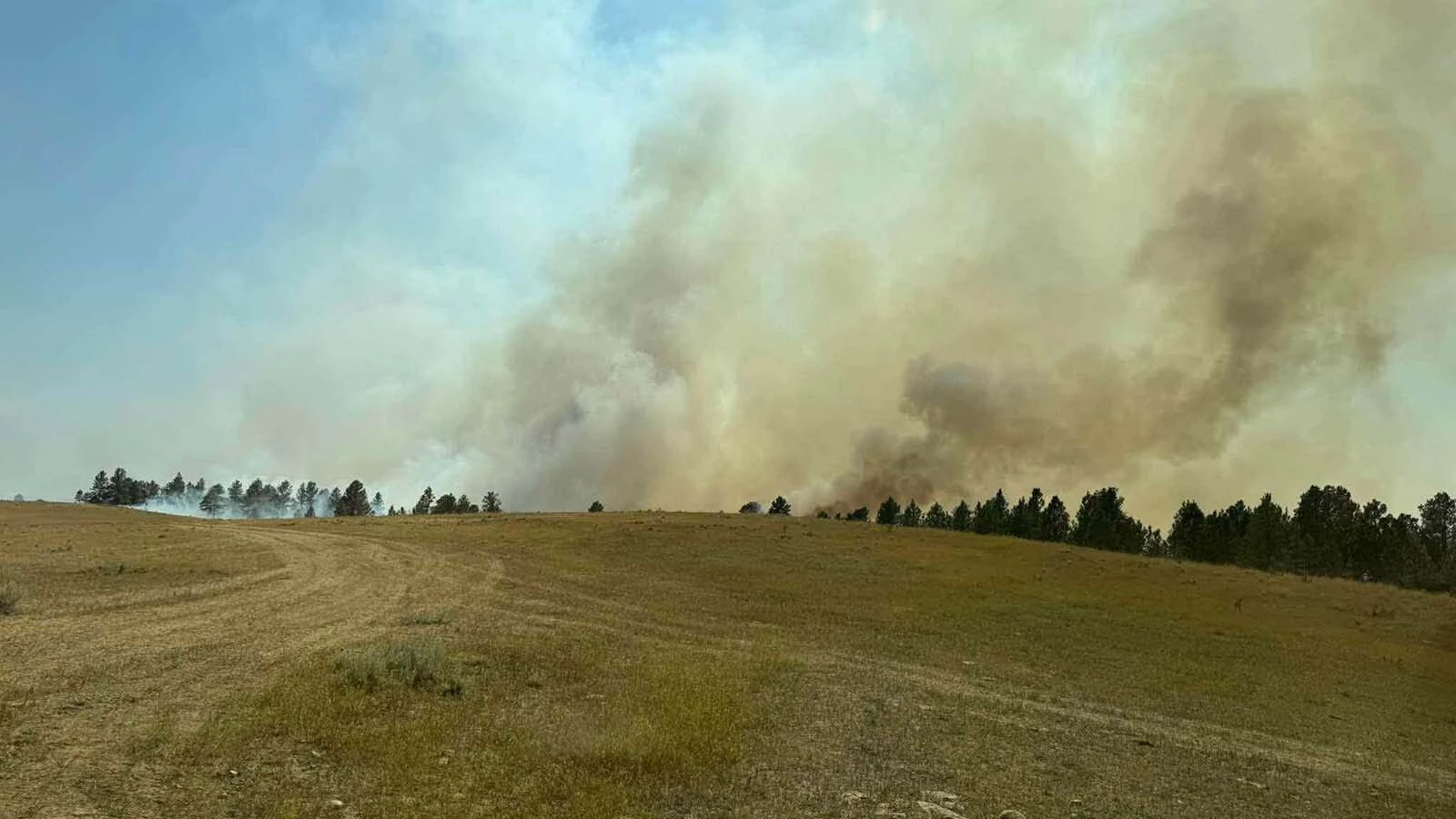 Devils Tower National Monument continues to be closed as a wildfire burning just southwest of the monument’s boundary has so far consumed nearly 300 acres without containment. “This is genuinely serious,” observed a nearby camper.