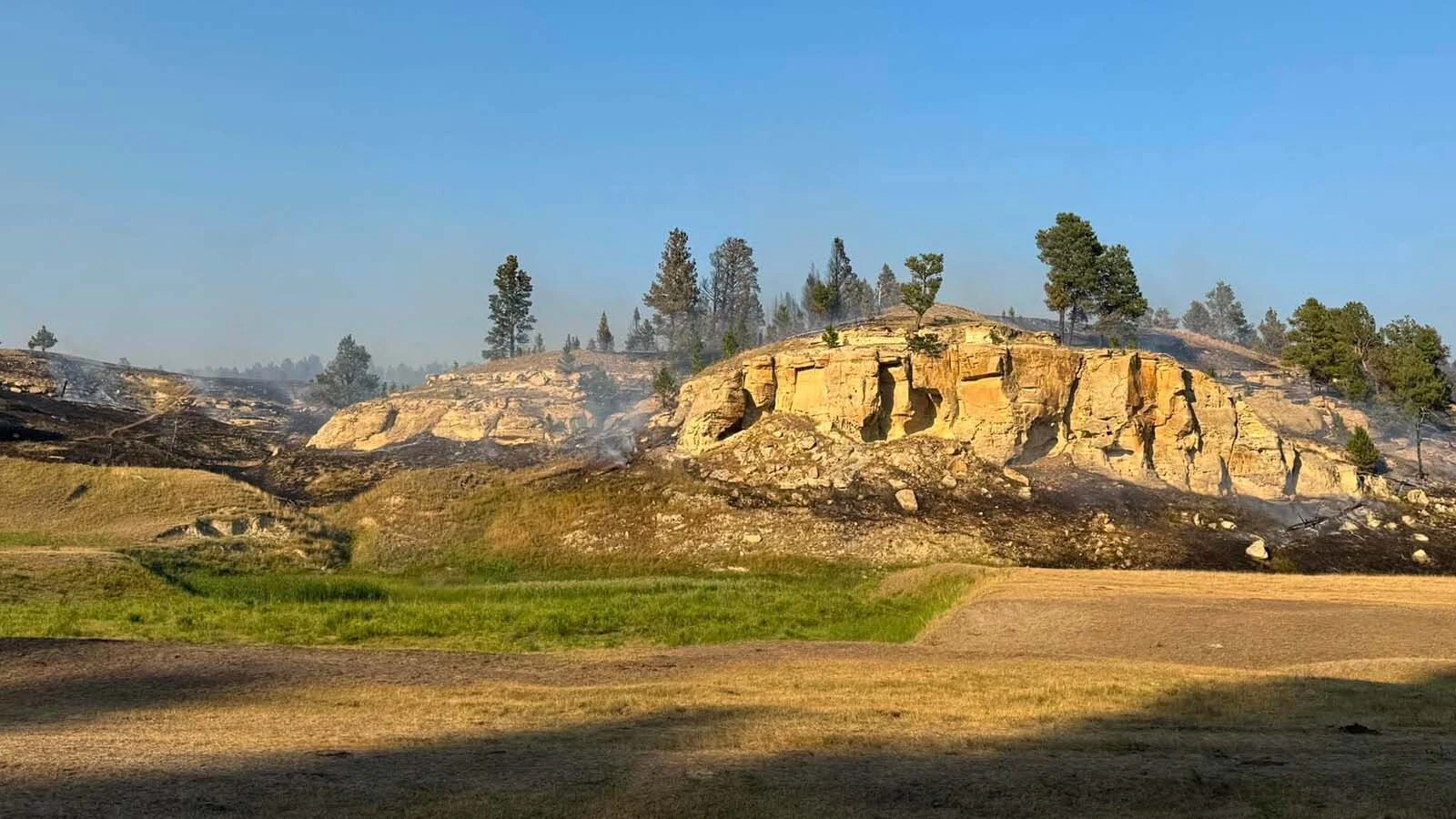 Devils Tower National Monument continues to be closed as a wildfire burning just southwest of the monument’s boundary has so far consumed nearly 300 acres without containment. “This is genuinely serious,” observed a nearby camper.
