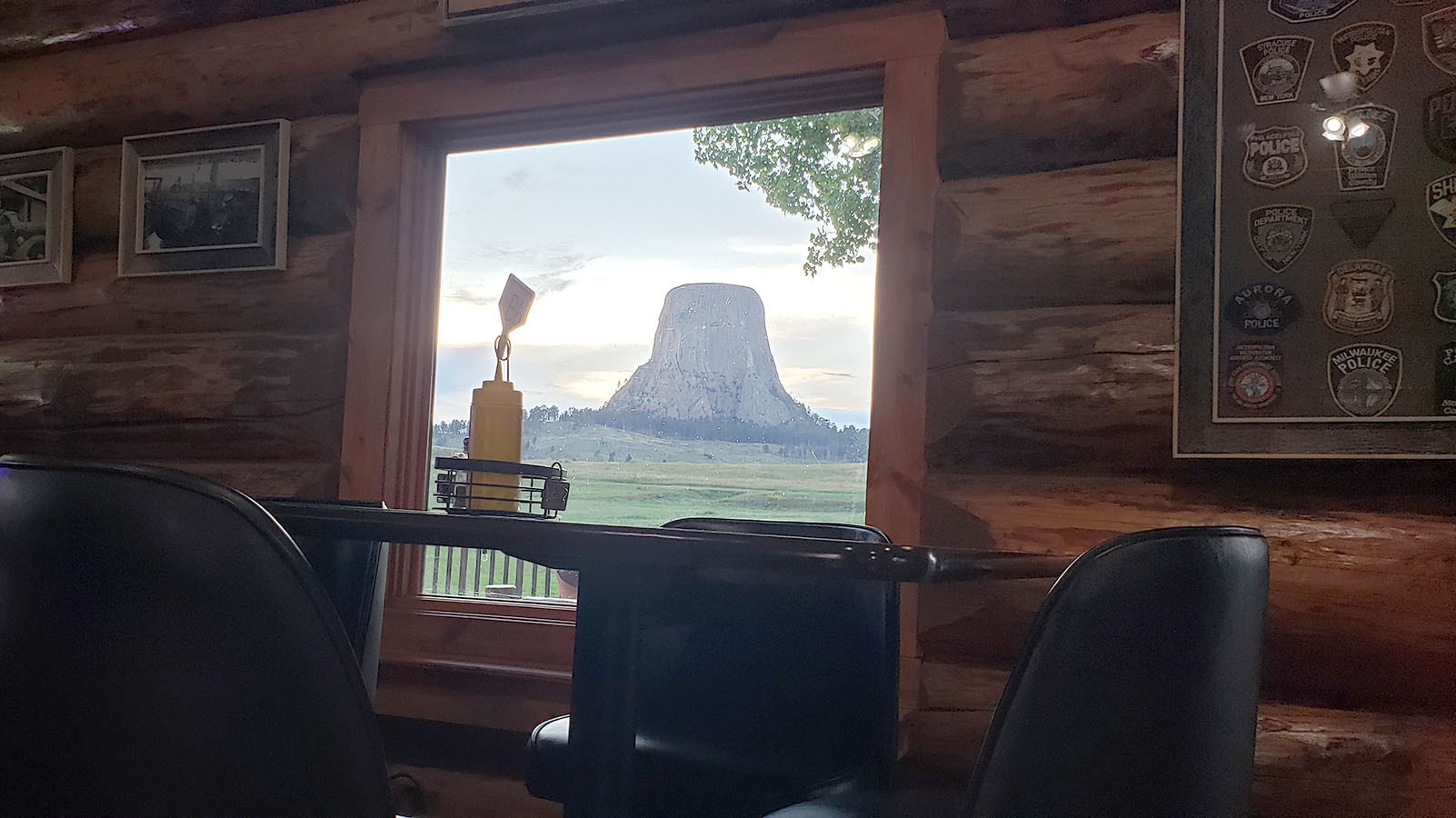 A picture window in the dining room frames Devils Tower in the distance.