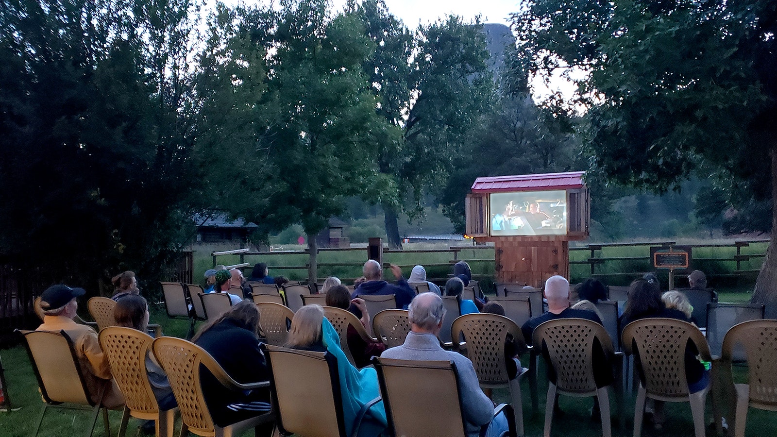 The movie "Close Encounters of the Third Kind" is shown every night at the Devils Tower KOA. The tower can be seen in the background as the movie plays.