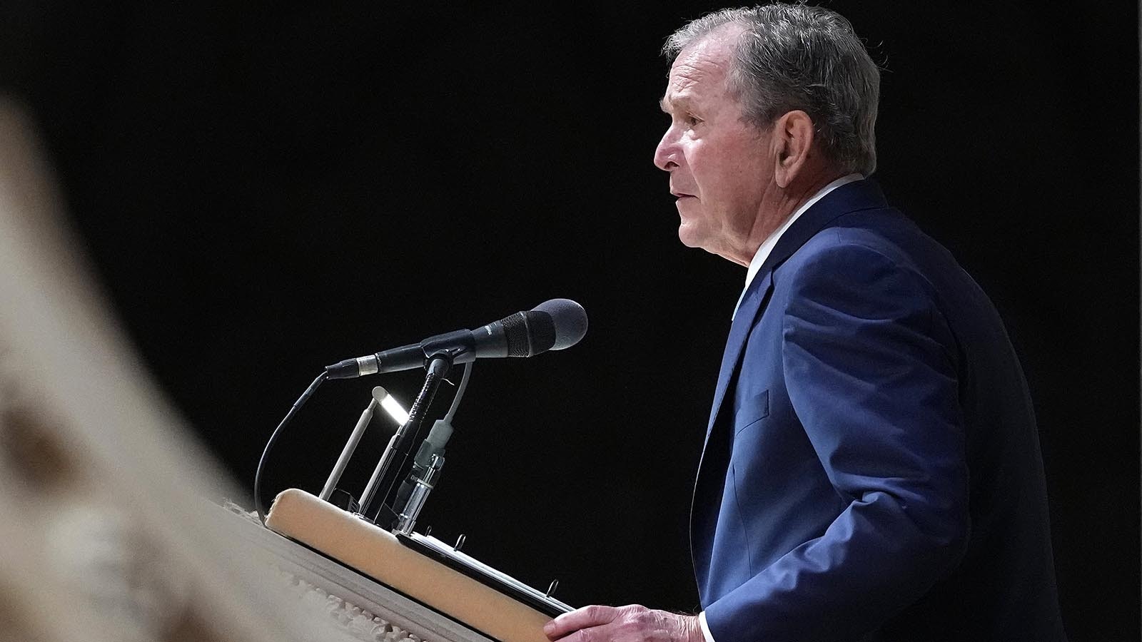 Former U.S. President George W. Bush delivers a tribute during the funeral service of former Vice President Dick Cheney.
