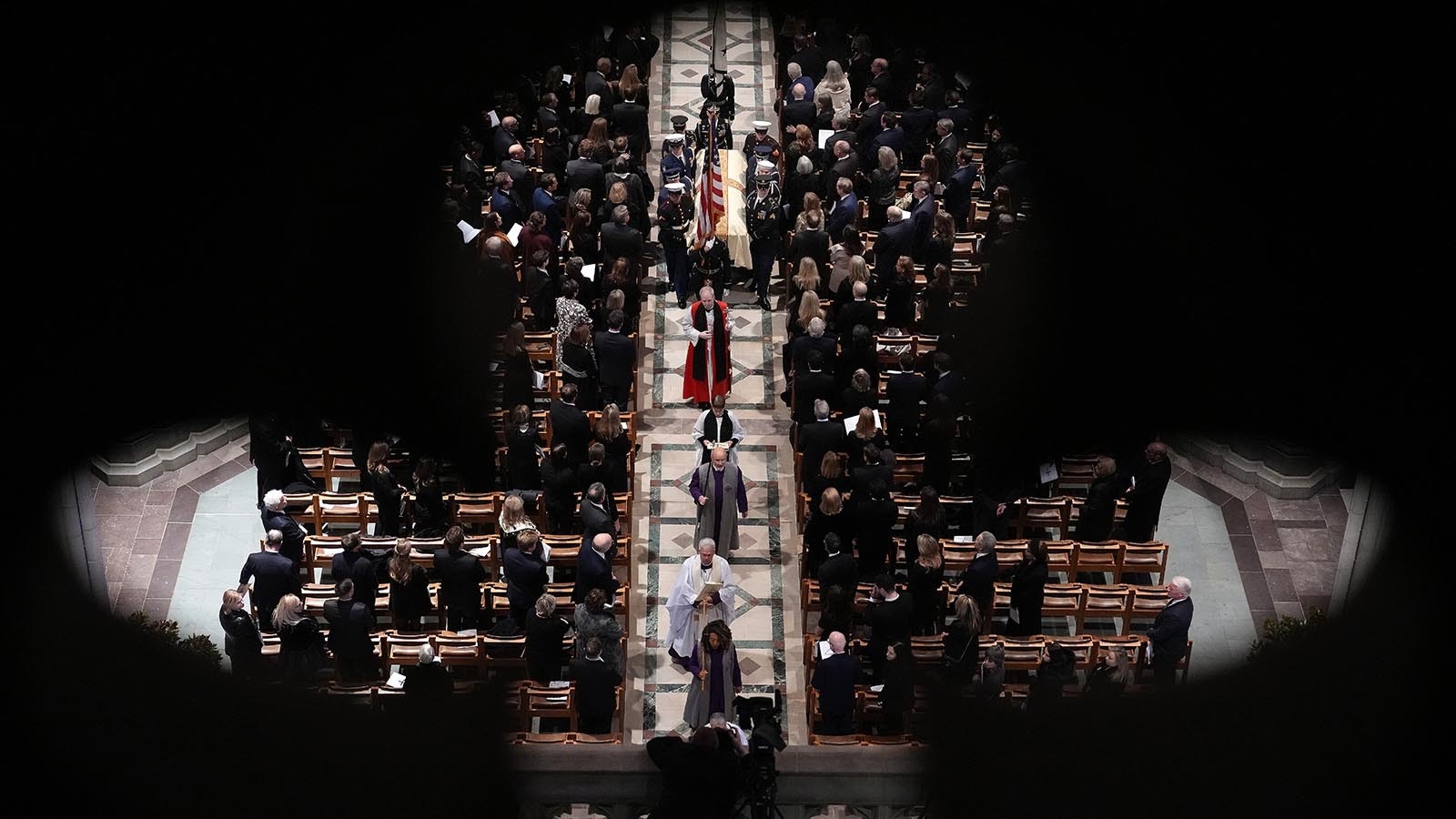 U.S. military body bearers carry the casket containing the remains of former Vice President Dick Cheney out of the National Cathedral during Cheney's funeral on Nov. 20, 2025, in Washington, D.C.