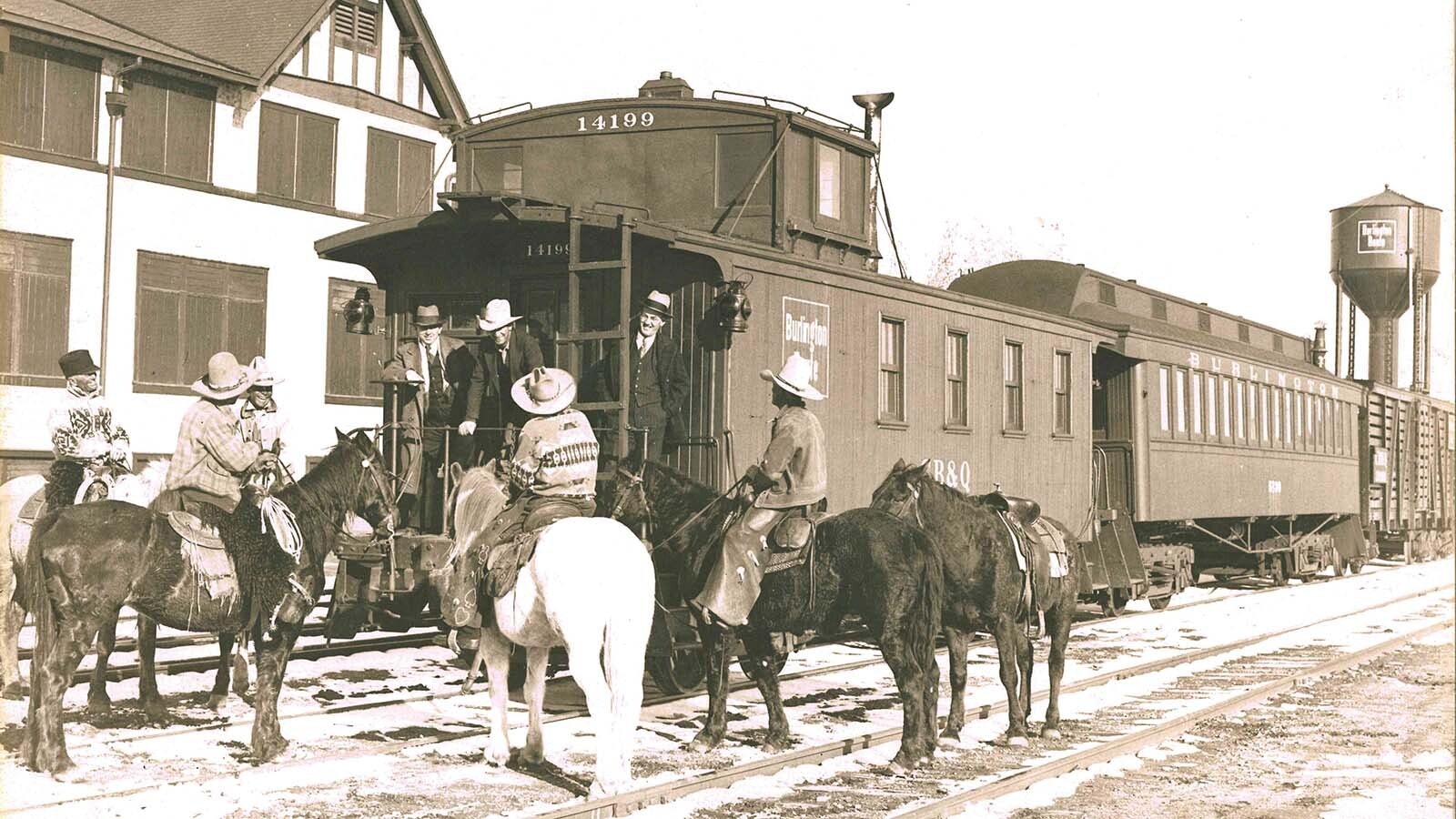 Railroad man Dick Nelson witnessed the wild times at rowdy railroad towns and wrote about his adventures, preserving the history for future generations, including his own grandchildren who are honoring his legacy. (He is the furthest right man standing on the caboose deck.)