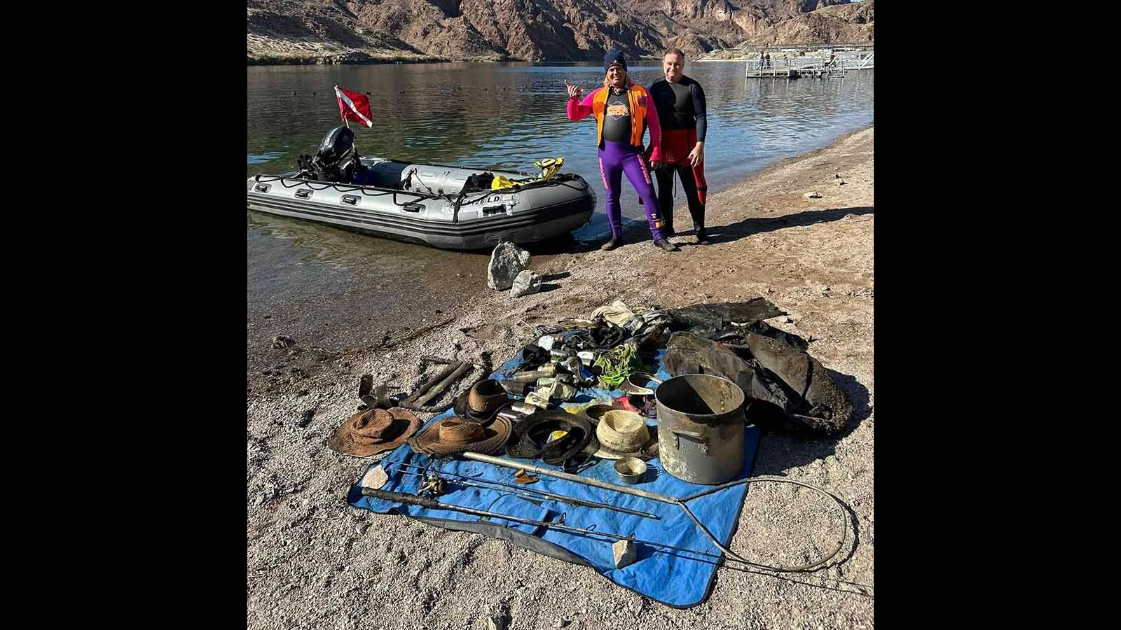 Divers in a stretch of the Colorado River below the Hoover Dam show off their daily haul.