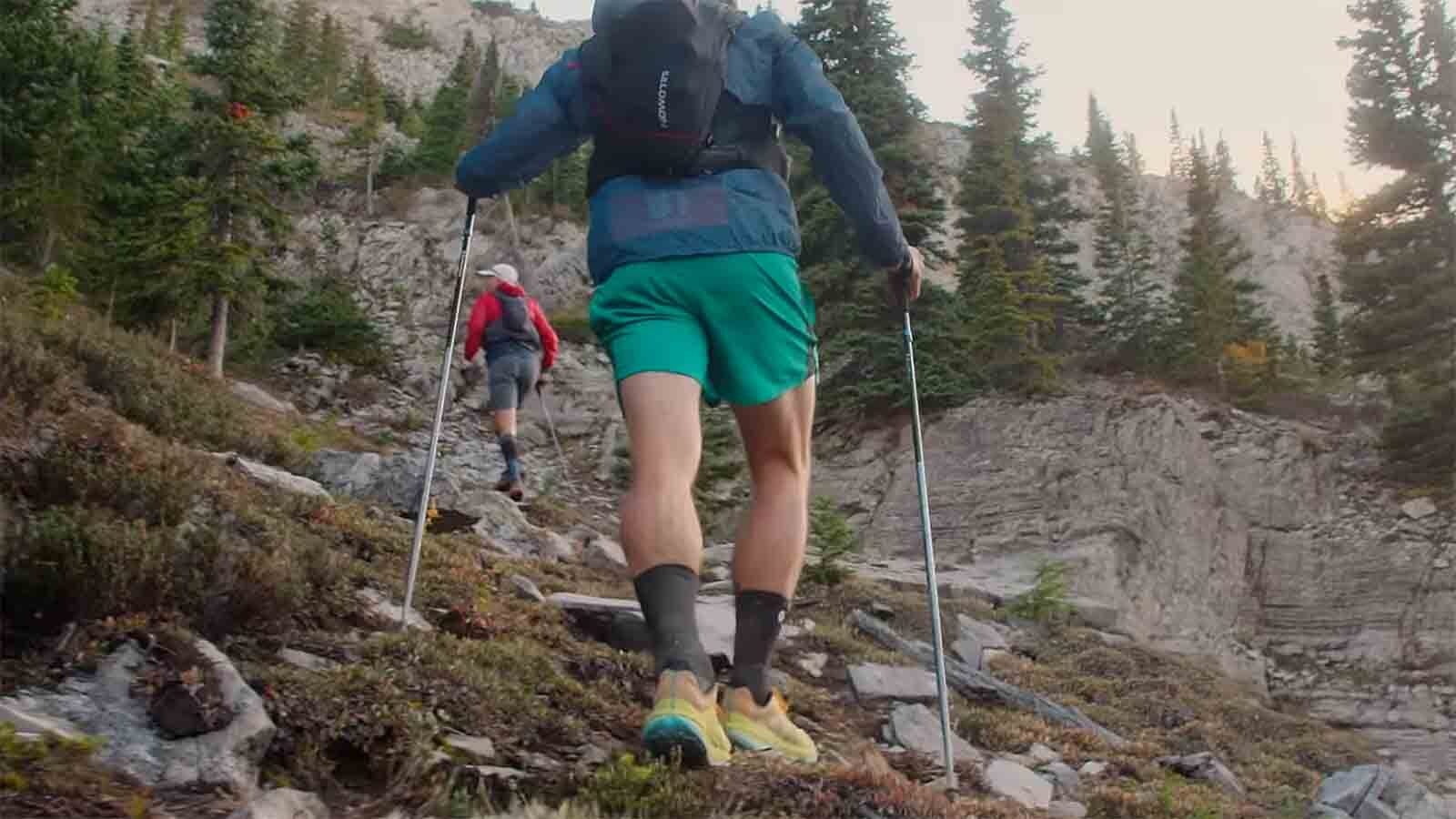 Ultramarathon trail runners in Alberta, Canada, had to be re-routed late Sunday after a grizzly charged and followed nearby campers. A Wyoming ultramarathoner says racers should carry bear spray in grizzly country.