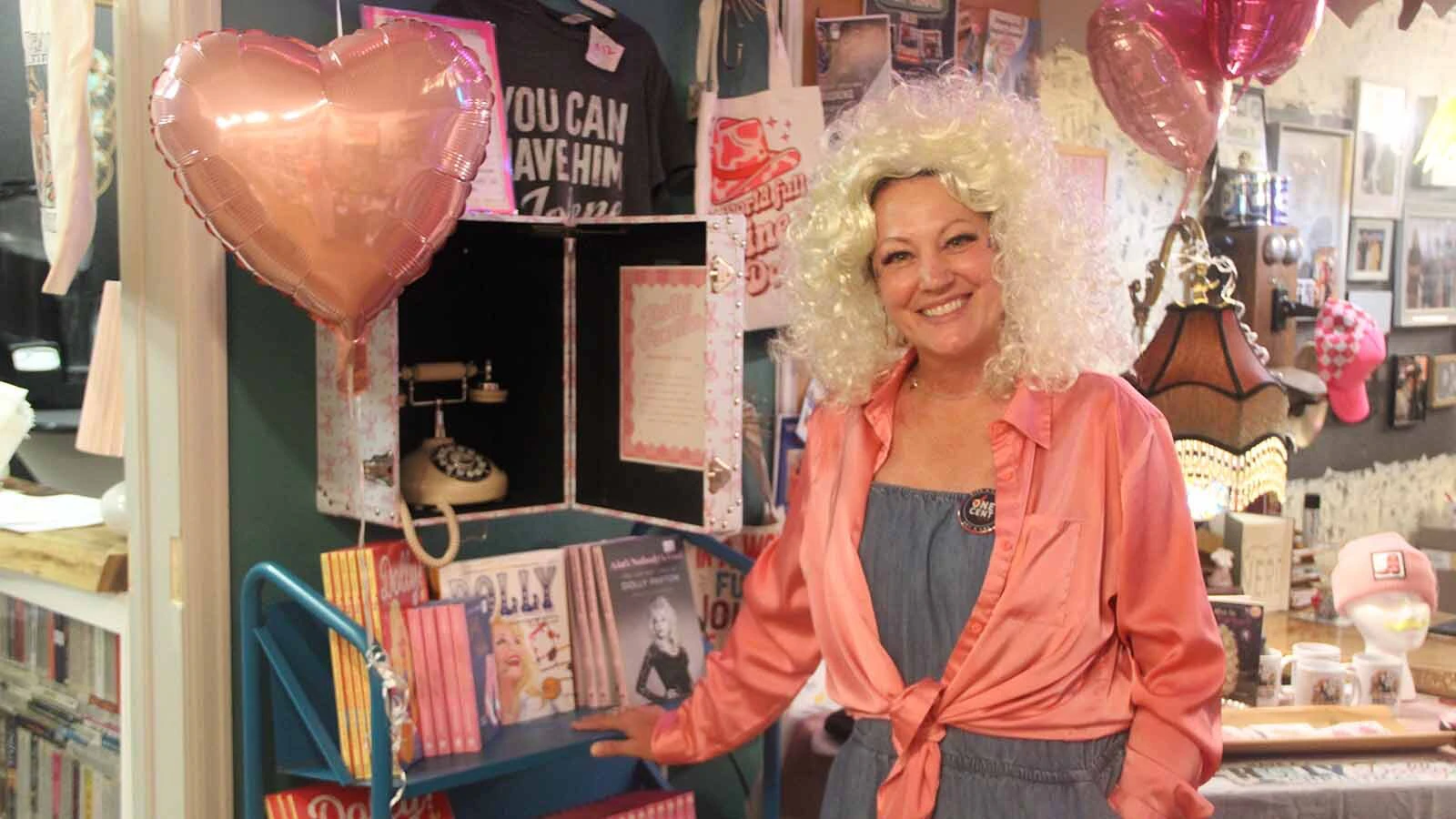 Kristy Bussey, owner of Bookin' It bookstore, gave away free books in honor of Dolly Parton.