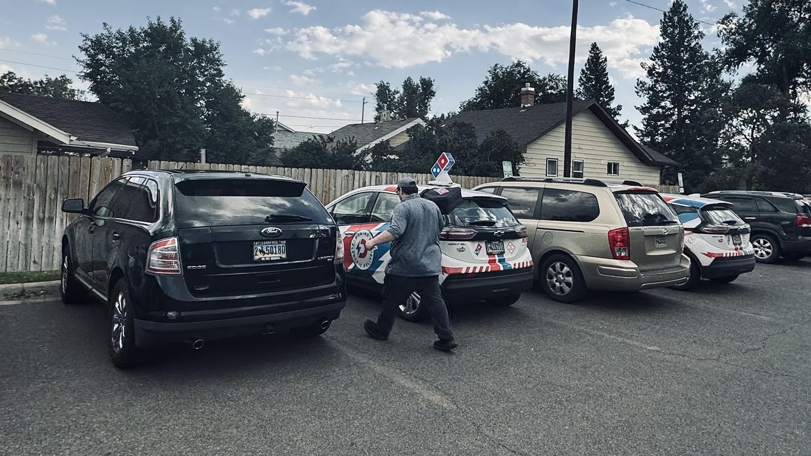 Domino's pizza franchises in Cheyenne have added Chevy Bolt electric delivery vehicles to their their fleet and plan to buy more.